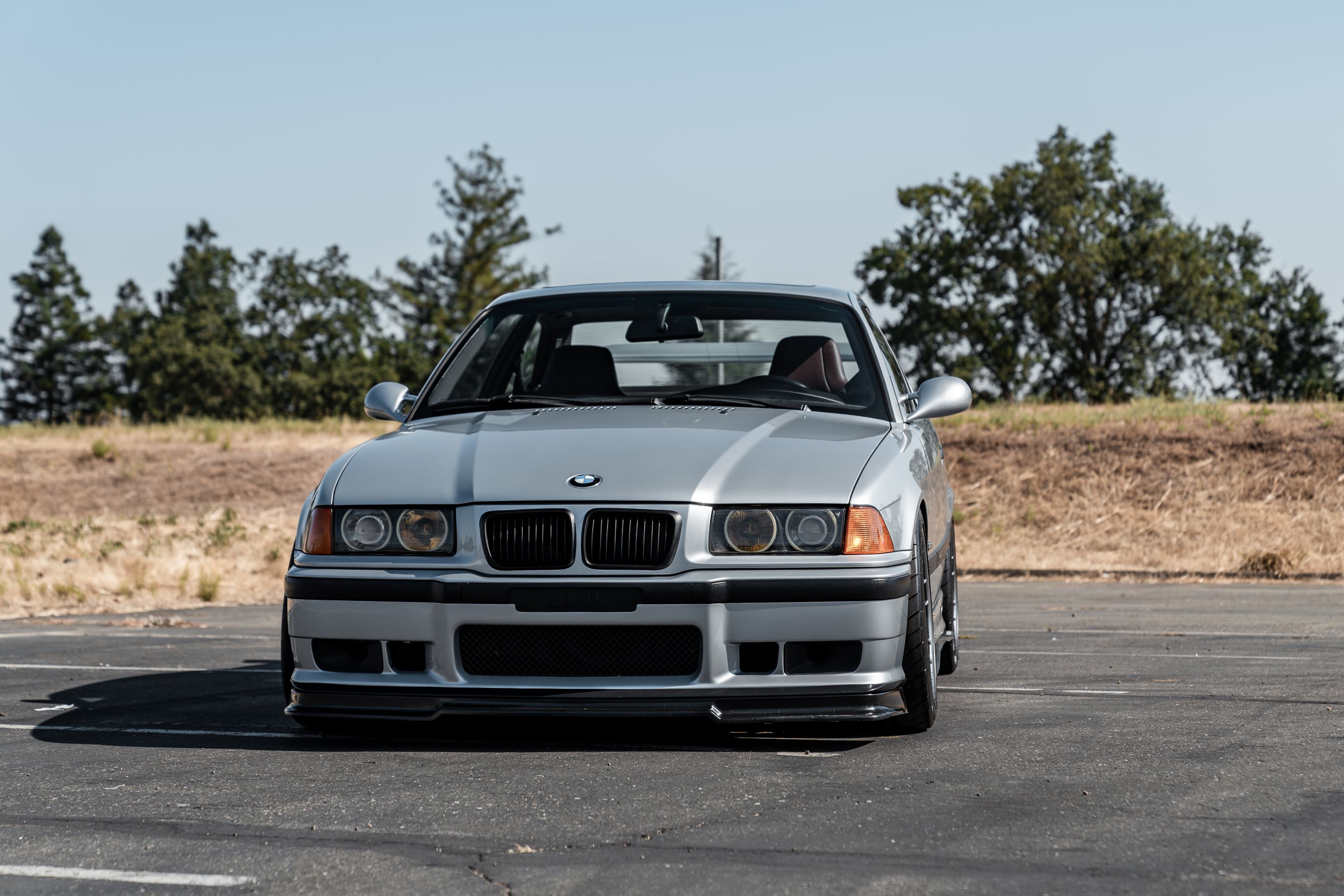 Silver BMW E36 M3 with 17" ARC-8 Apex wheels in Anthracite