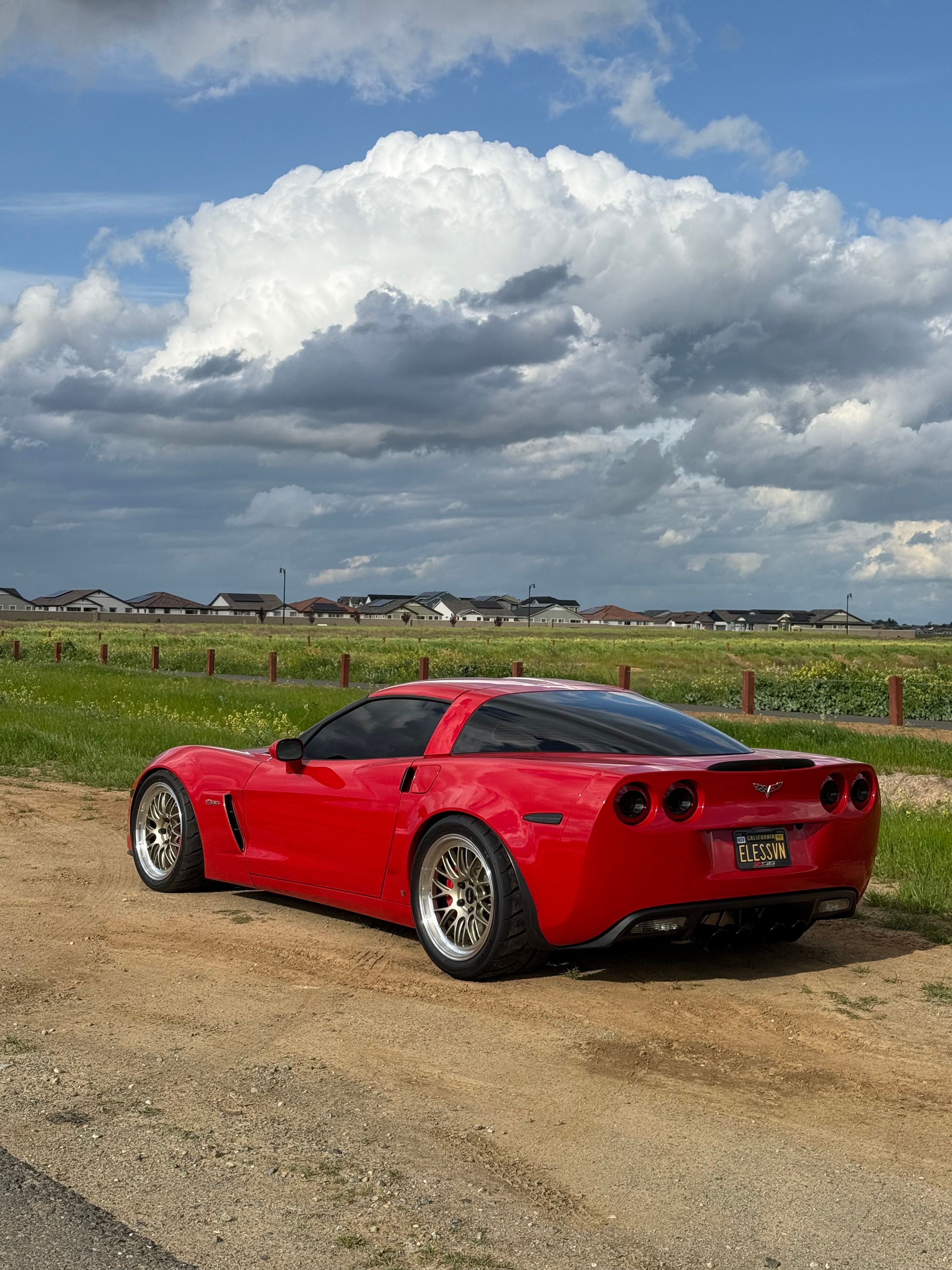 Red Chevrolet C6 Corvette Z06 with 19" ML-10RT Apex wheels in Machined Lip Gloss Motorsport Gold
