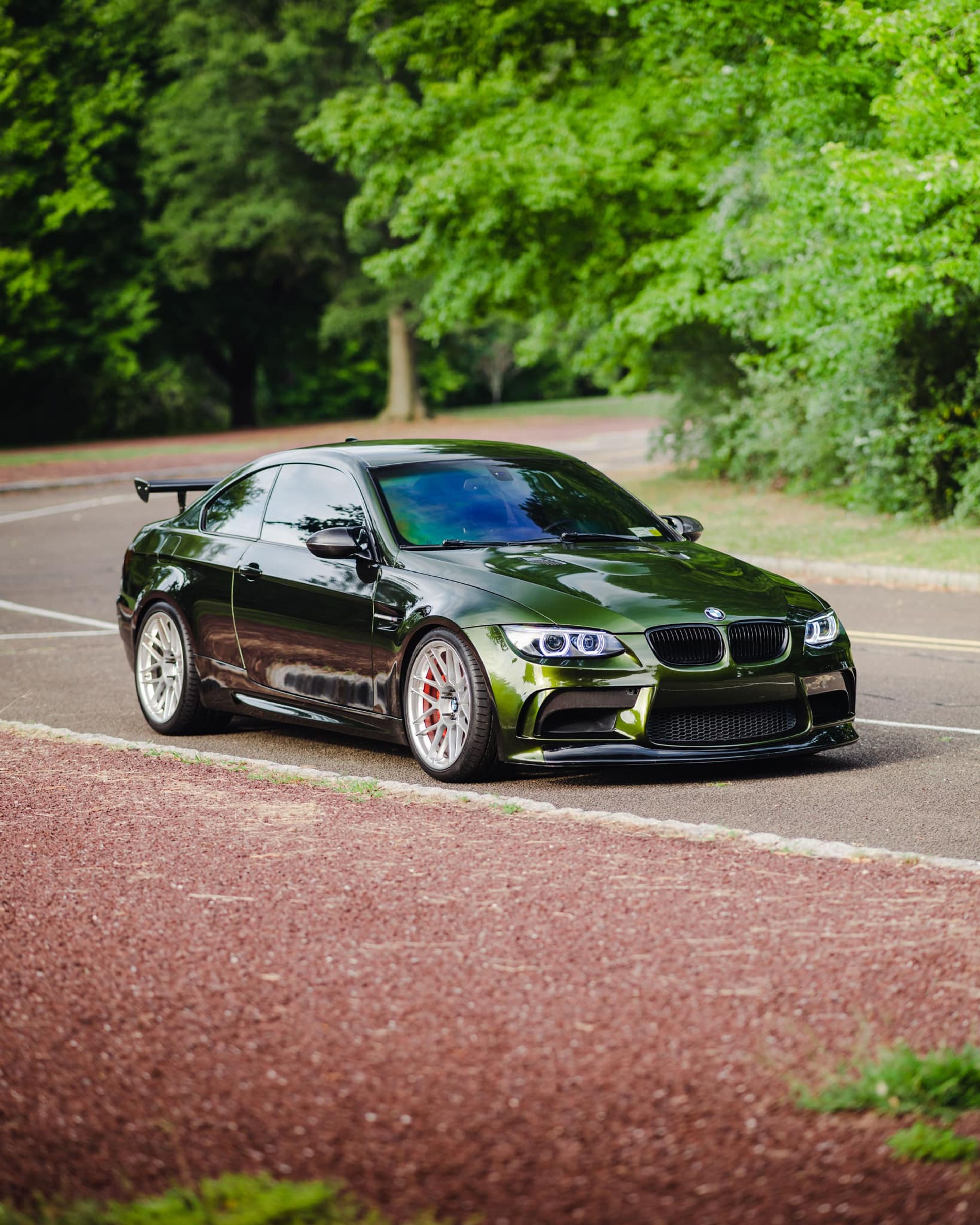 Green BMW E92 Coupe M3 with 19" ARC-8 Apex wheels in Hyper Silver