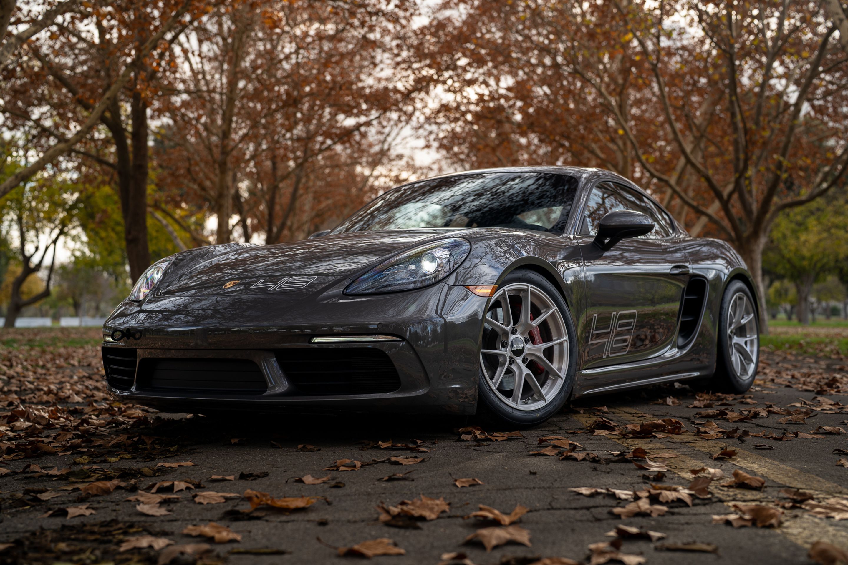 Grey Porsche 718 Cayman S with 18" VS-5RS Apex wheels in Brushed Clear