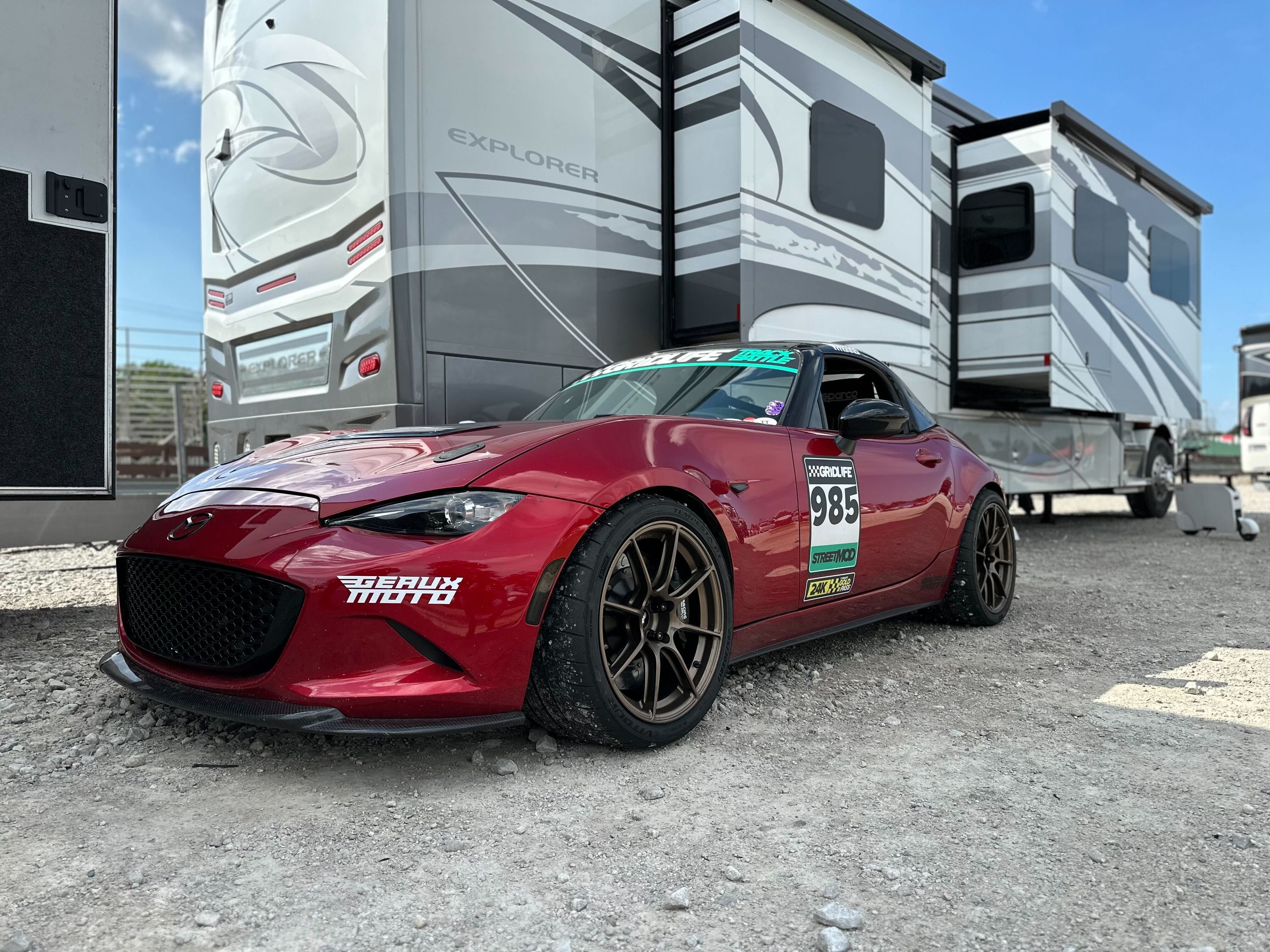Red Mazda ND MX-5 Miata with 17" SM-8RS Apex wheels in Satin Bronze
