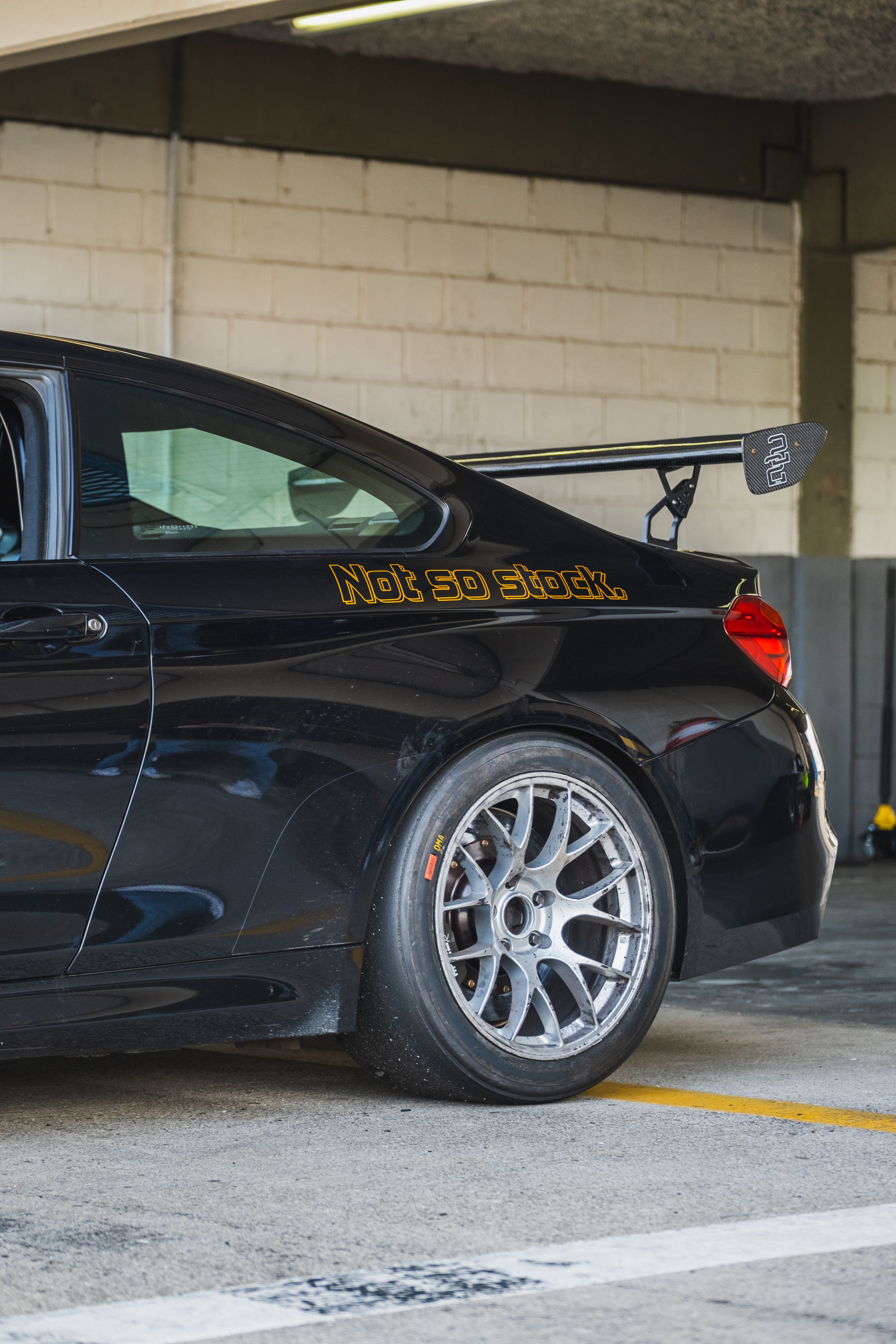 Black BMW F82 Coupe M4 with 18" EC-7 Apex wheels in Race Silver
