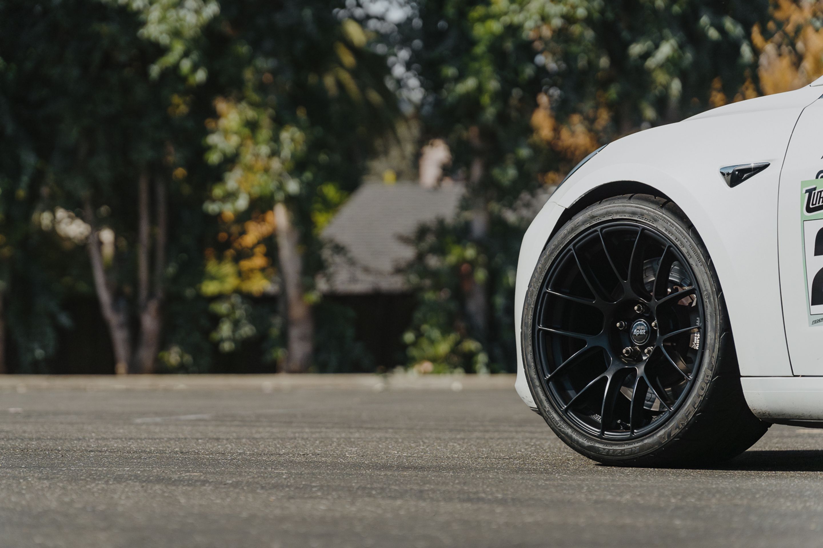 White Tesla Model 3 with 19" EC-7RS Apex wheels in Satin Black