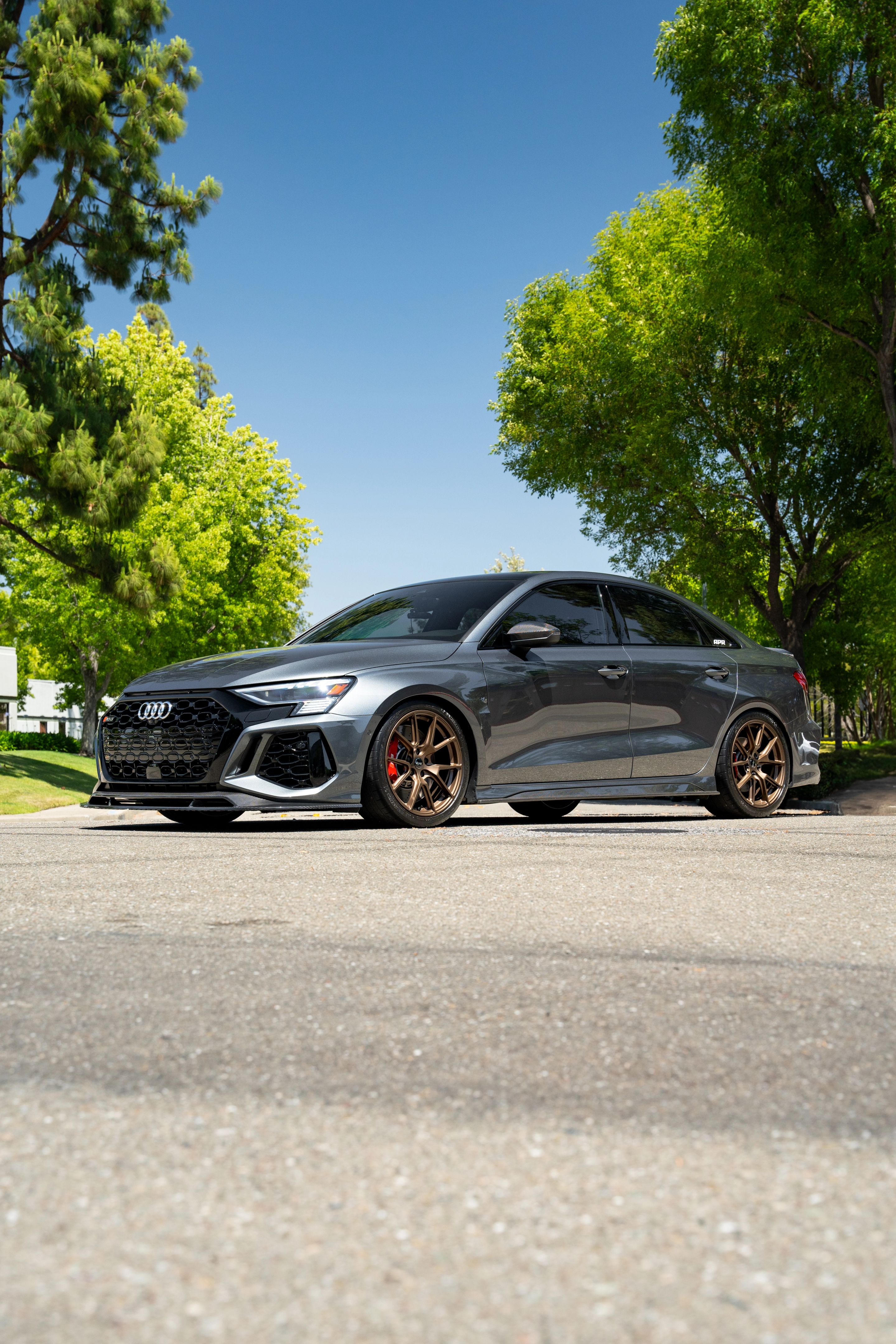 Grey Audi 8Y RS 3 with 18" VS-5 Apex wheels in Satin Bronze
