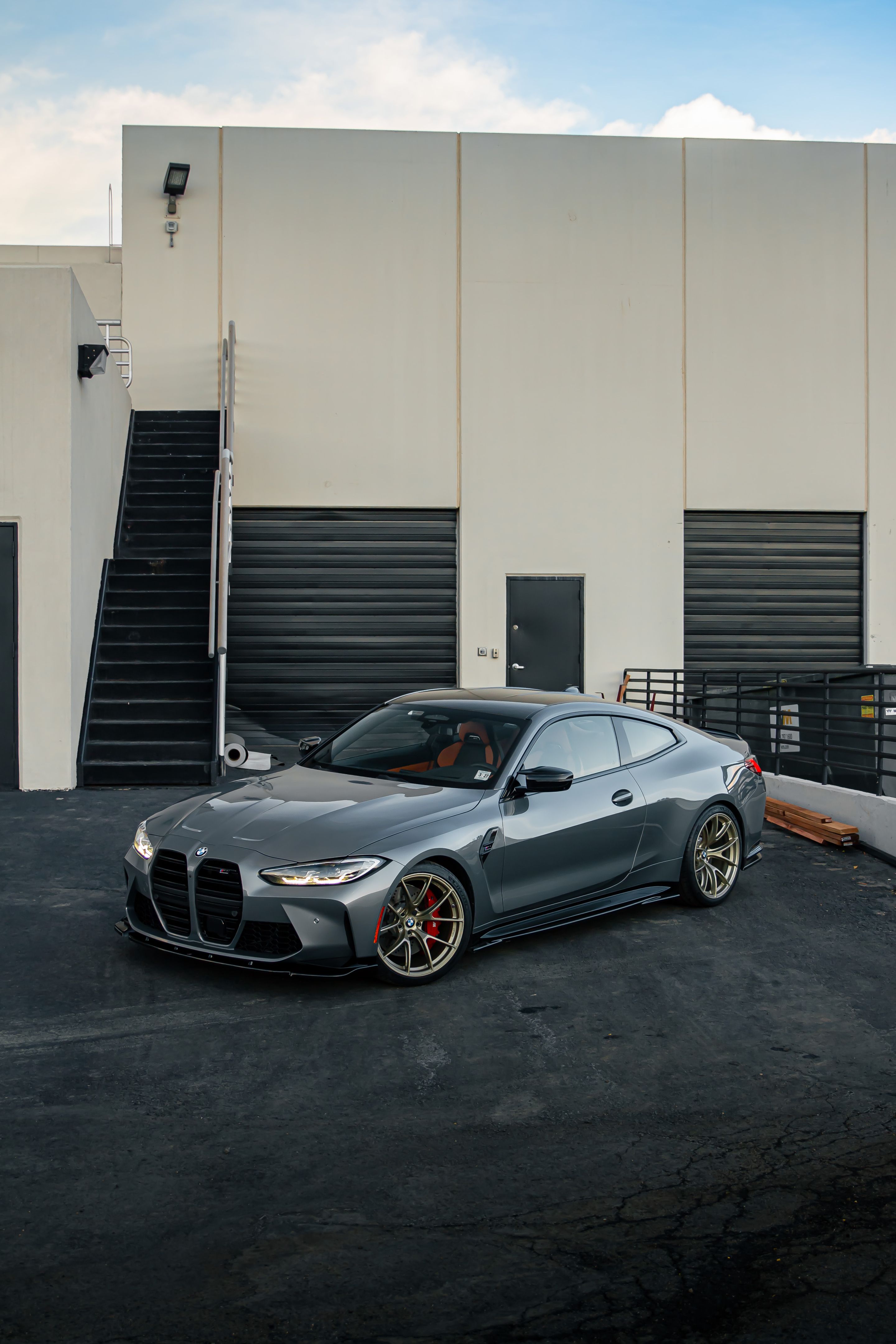 Grey BMW G82 Coupe M4 with 20" VS-5RS Apex wheels in Motorsport Gold