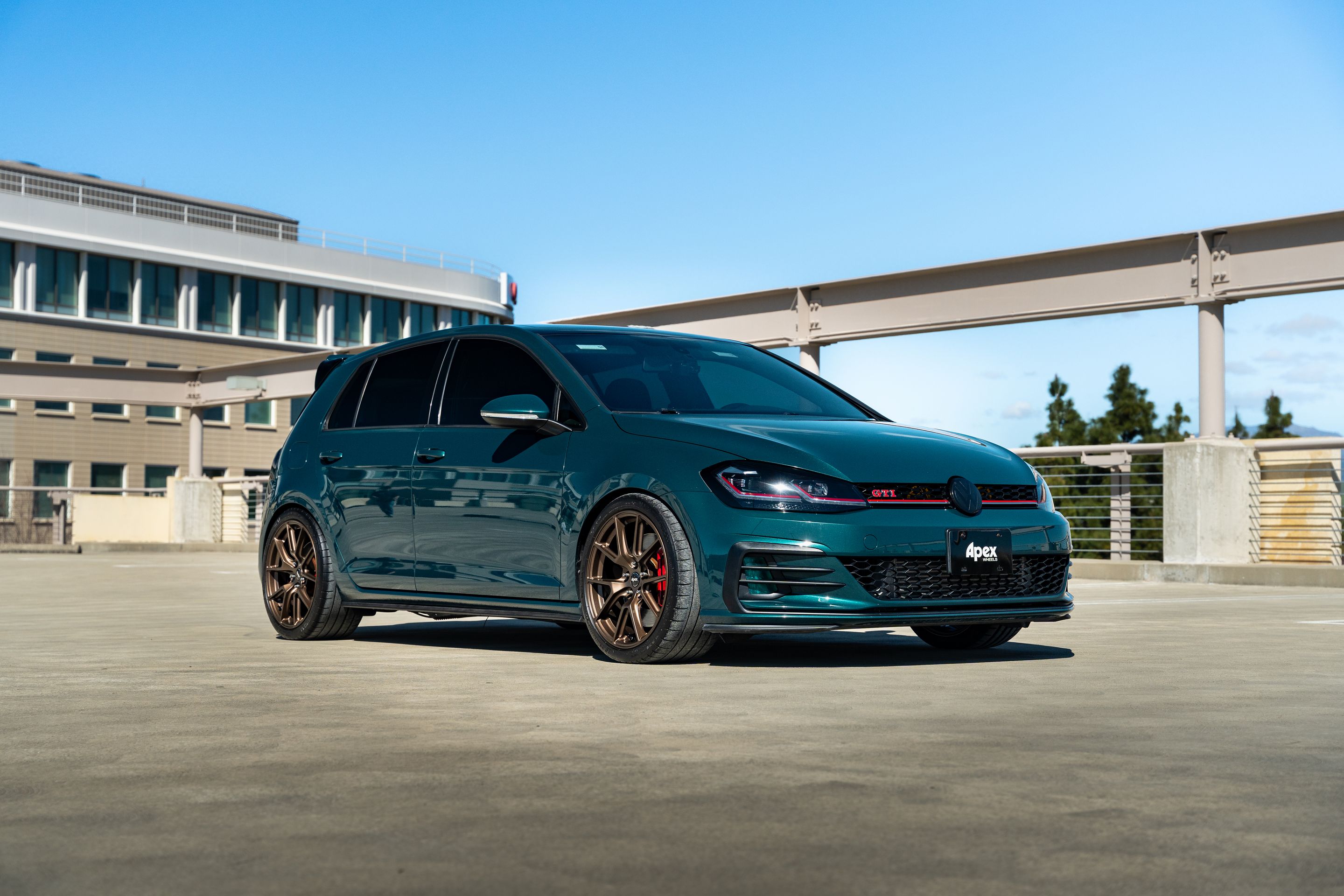 Green VW MK7 GTI with 18" VS-5 Apex wheels in Satin Bronze