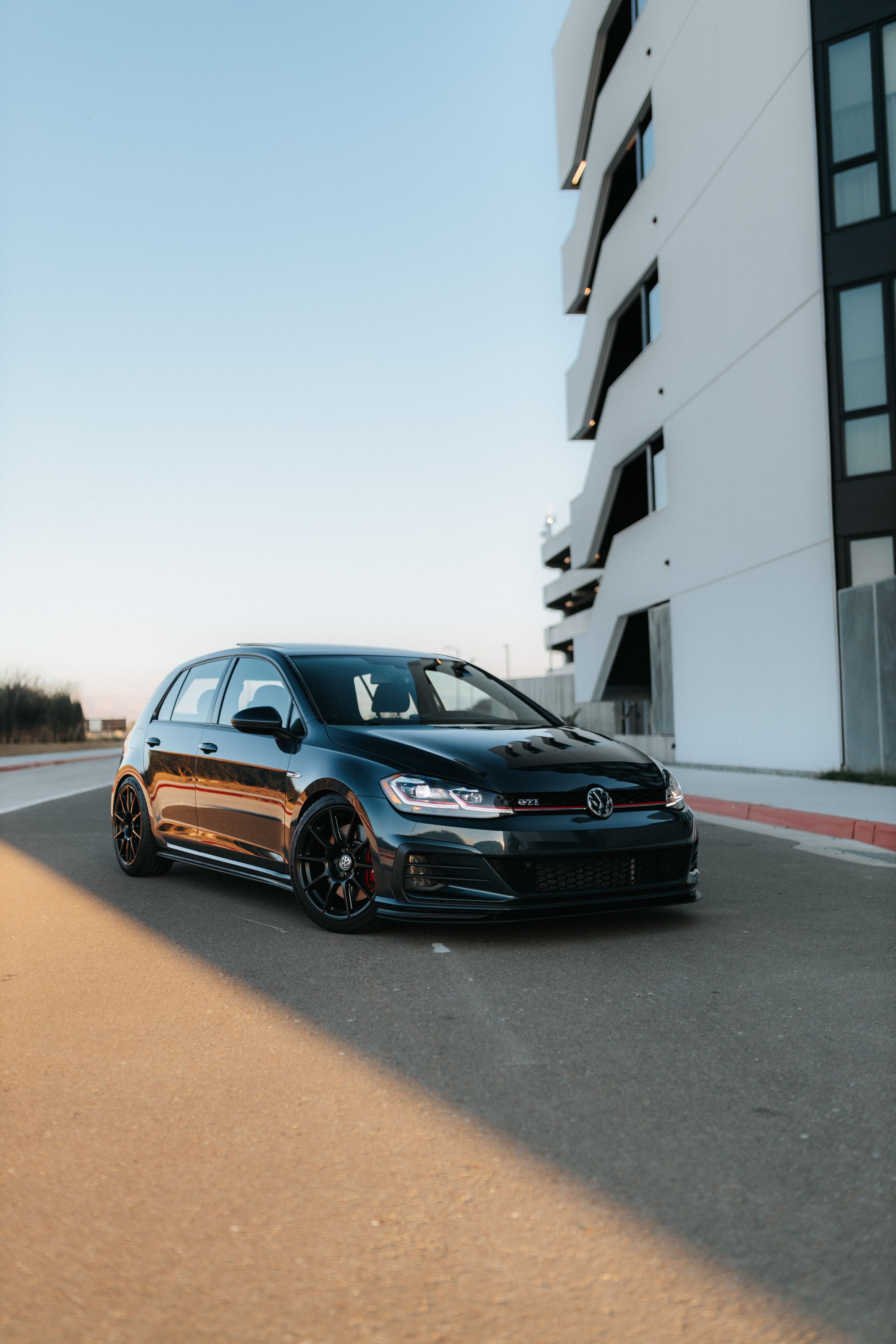 Grey VW MK7 GTI with 18" SM-10 Apex wheels in Satin Black