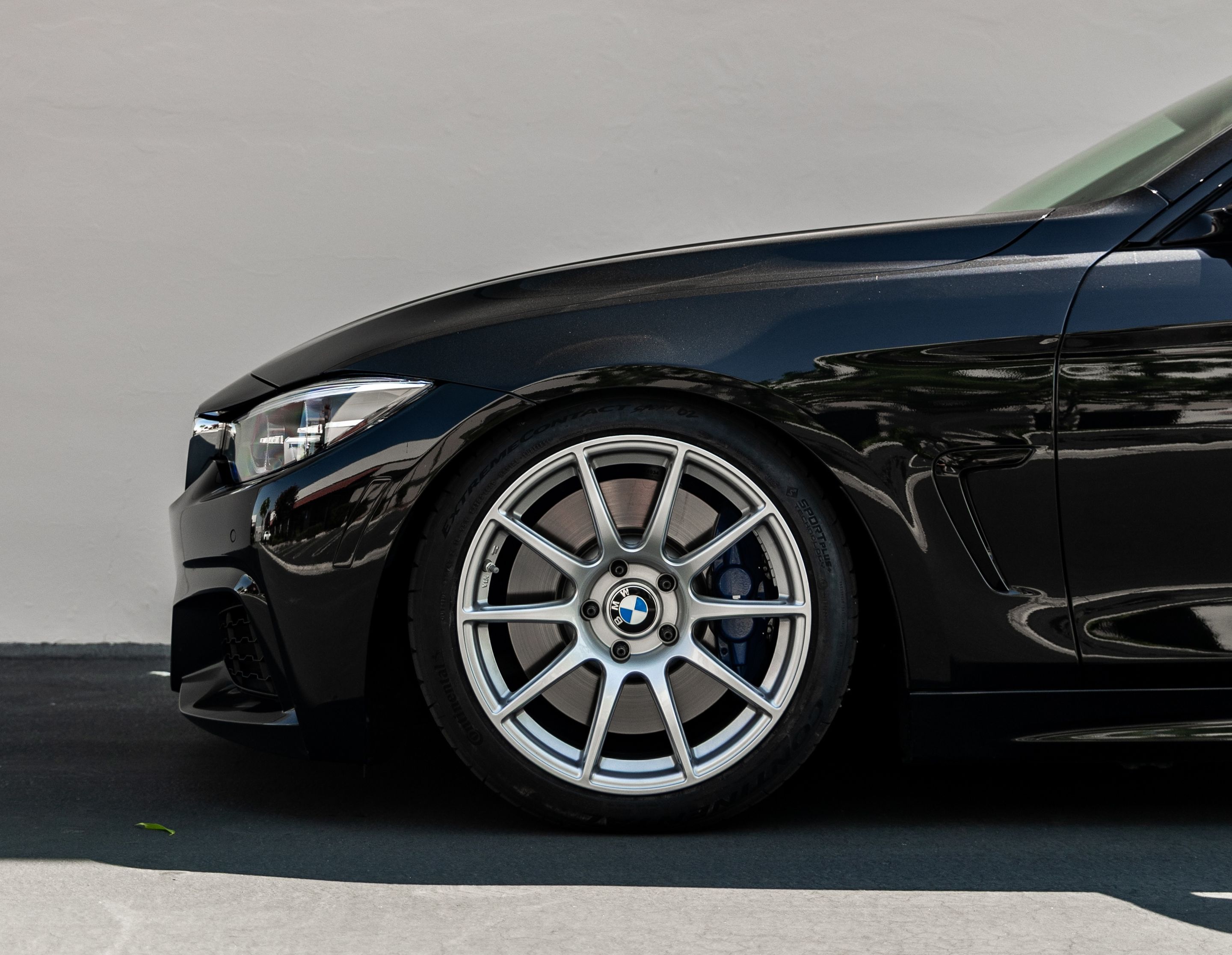 Black BMW F32 Coupe 4 Series with 18" SM-10 Apex wheels in Race Silver
