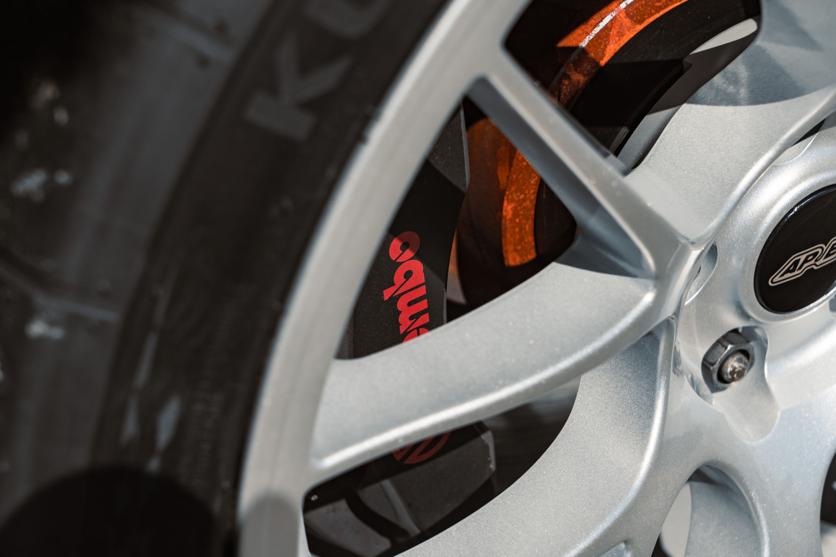 Red Ford S550 Mustang GT with 19" EC-7 Apex wheels in Race Silver