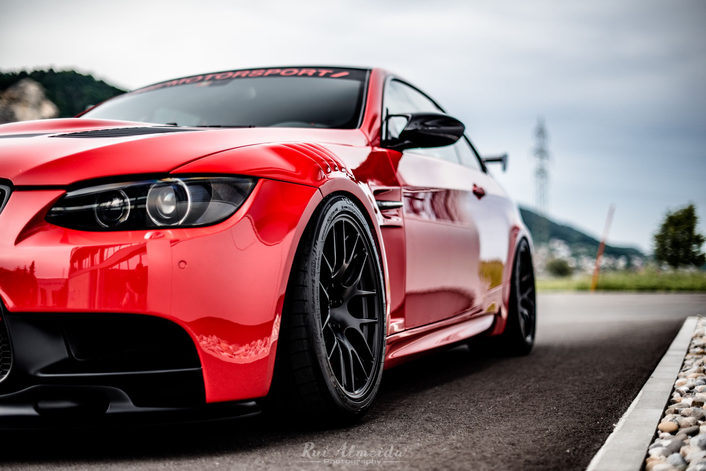 Red BMW E92 Coupe M3 with 18" EC-7R Apex wheels in Satin Black