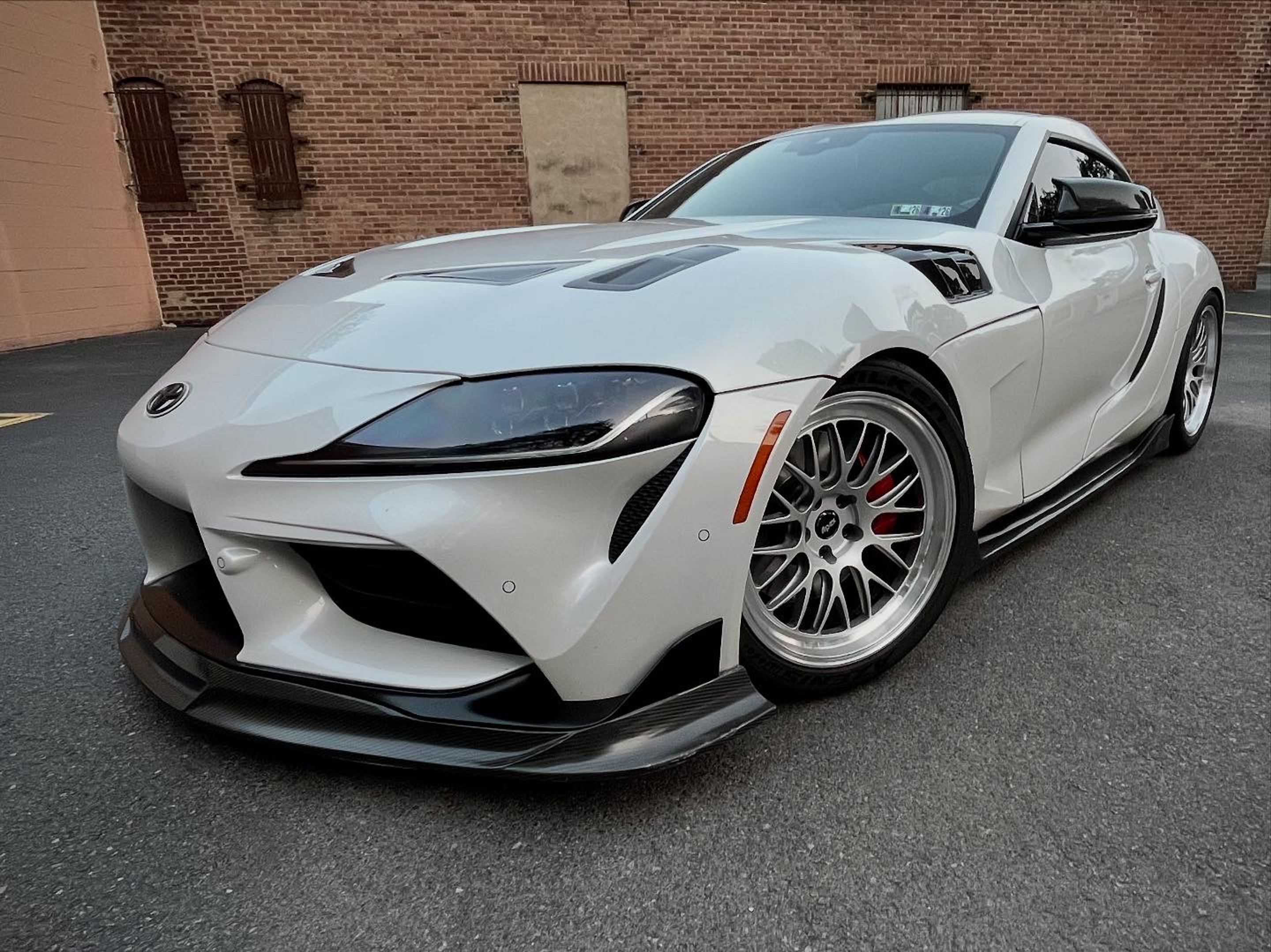 White Toyota GR Supra with 19" ML-10RT Apex wheels in Machined Lip Race Silver