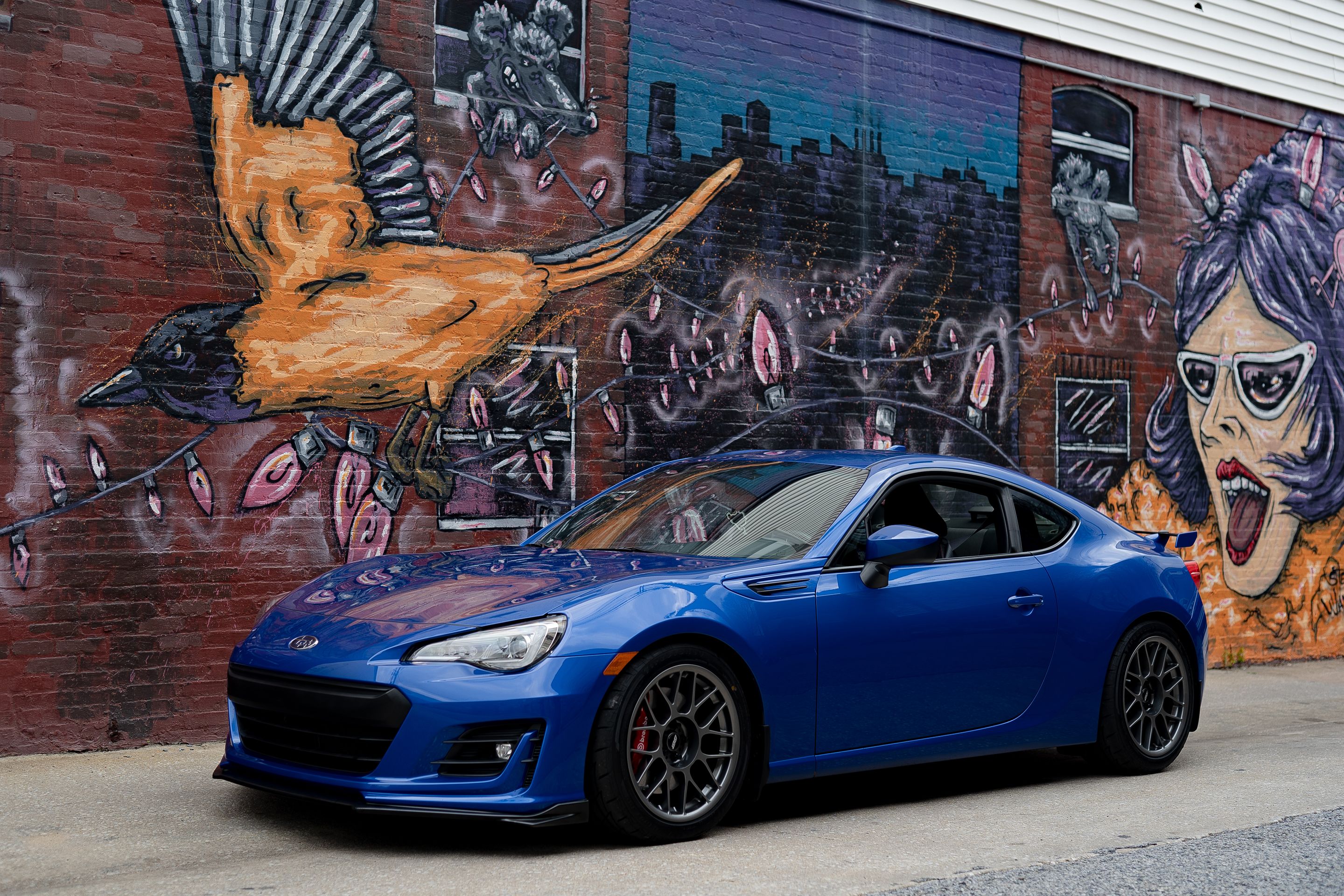 Blue Subaru ZC6 / Gen 1 BRZ with 17" ARC-8 Apex wheels in Anthracite