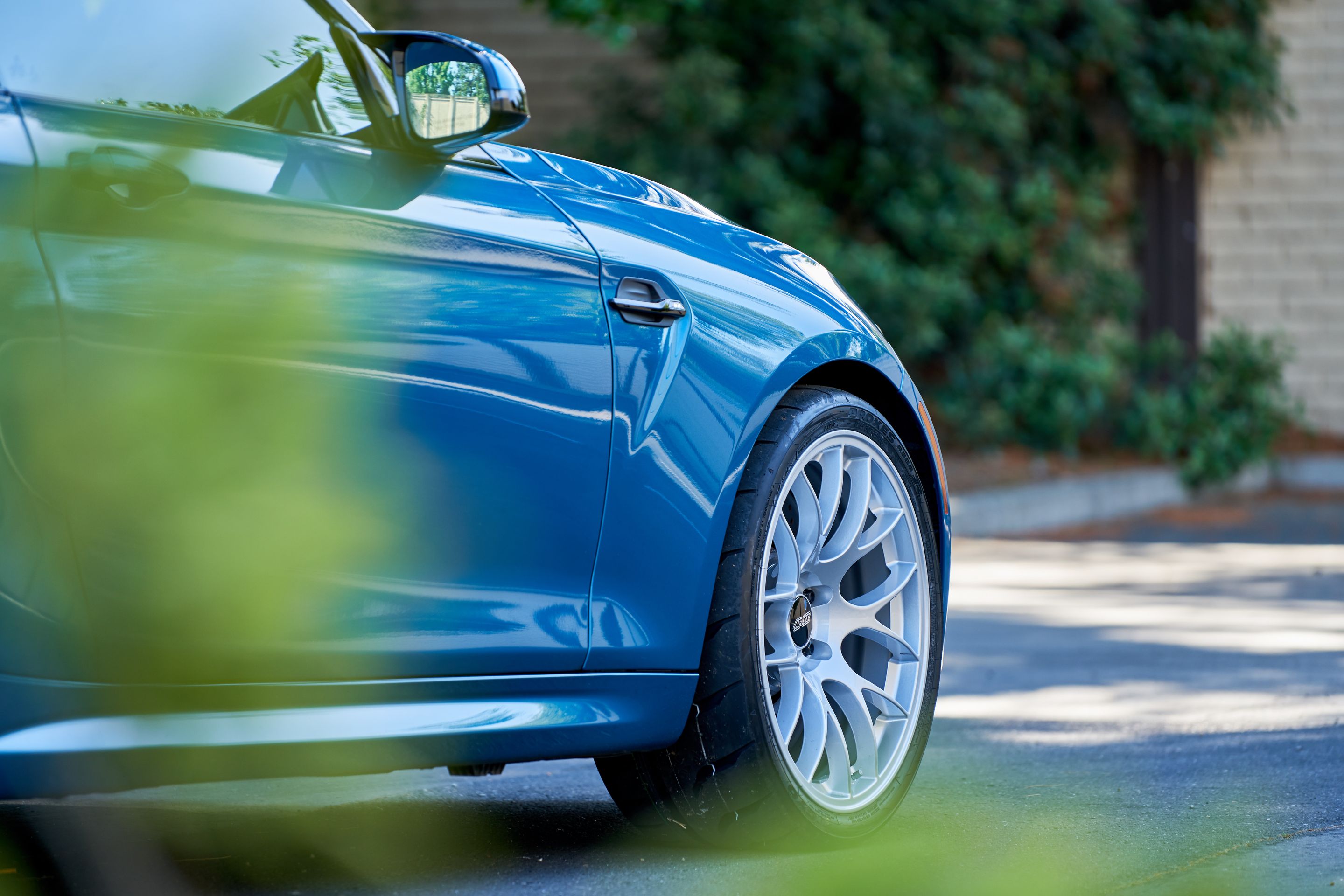 Blue BMW F87 M2 with 19" EC-7 Apex wheels in Race Silver