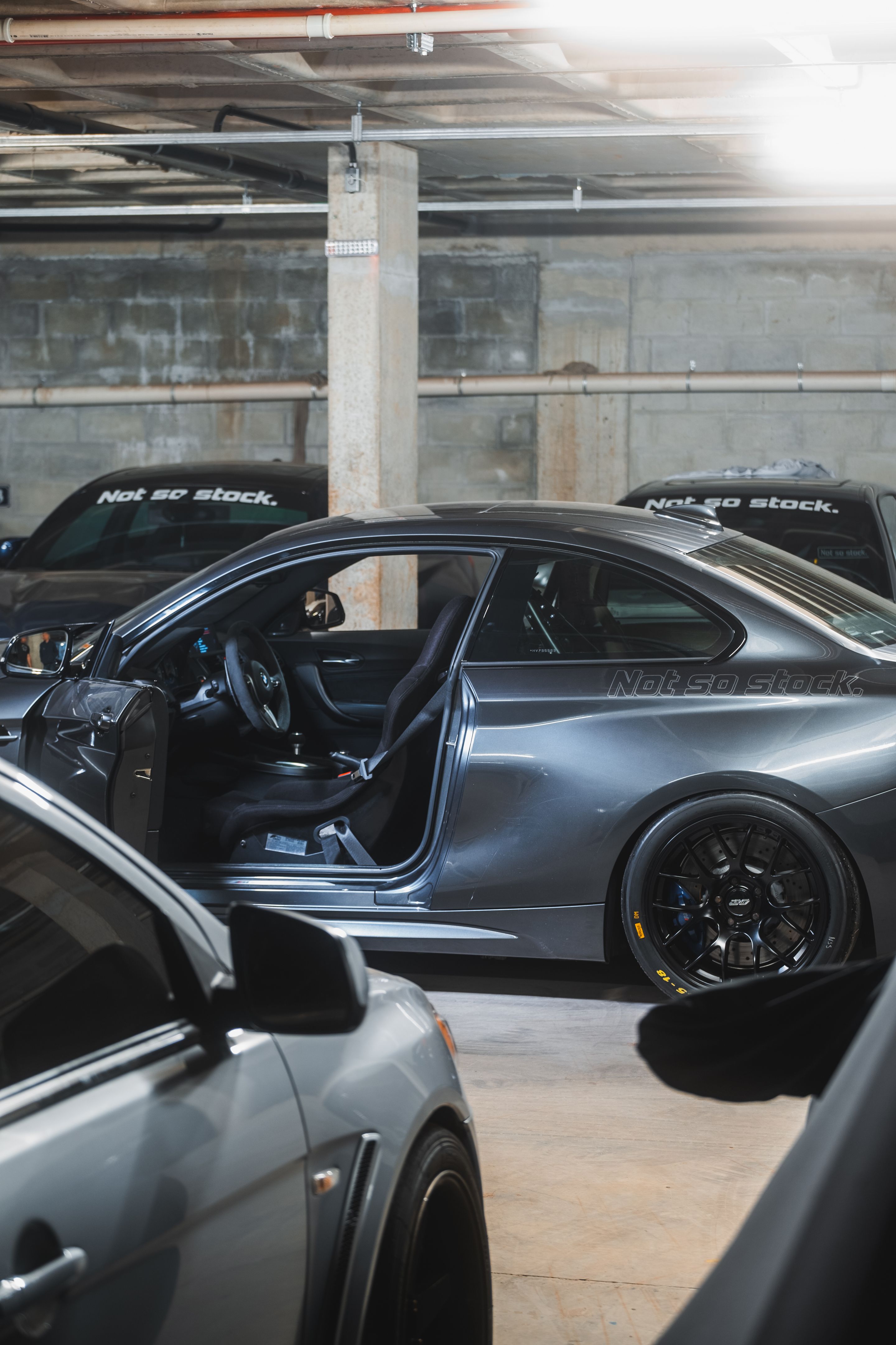 Black BMW F87 M2 with 18" EC-7 Apex wheels in Satin Black