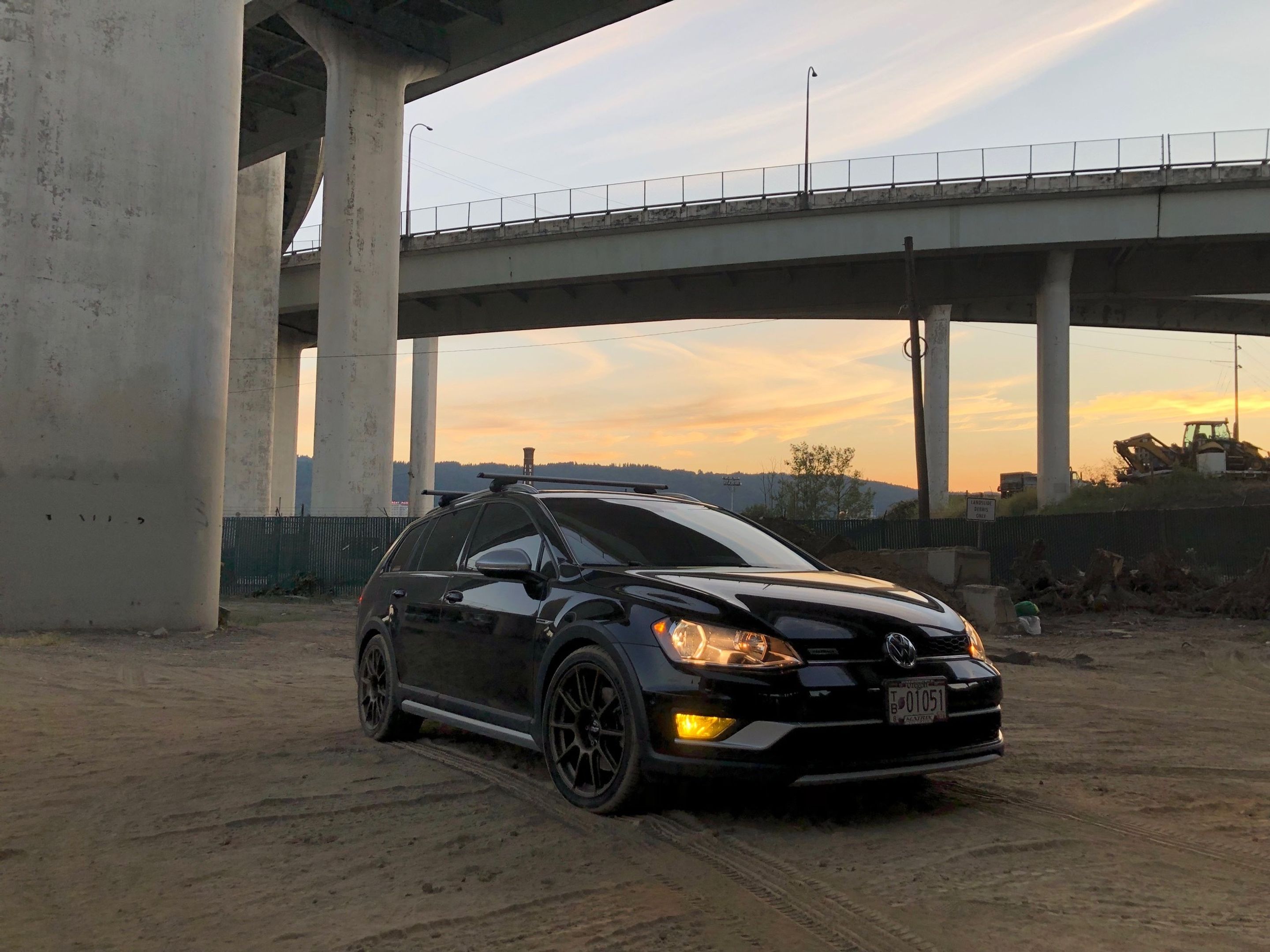 Black VW MK7 Alltrack/SportWagen Alltrack with 18" SM-10 Apex wheels in Satin Bronze