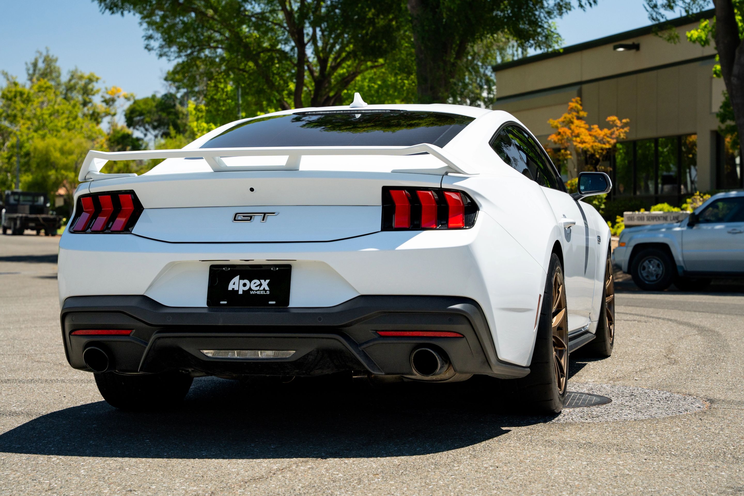 White Ford S650 Mustang GT with 18" VS-5RS Apex wheels in Satin Bronze