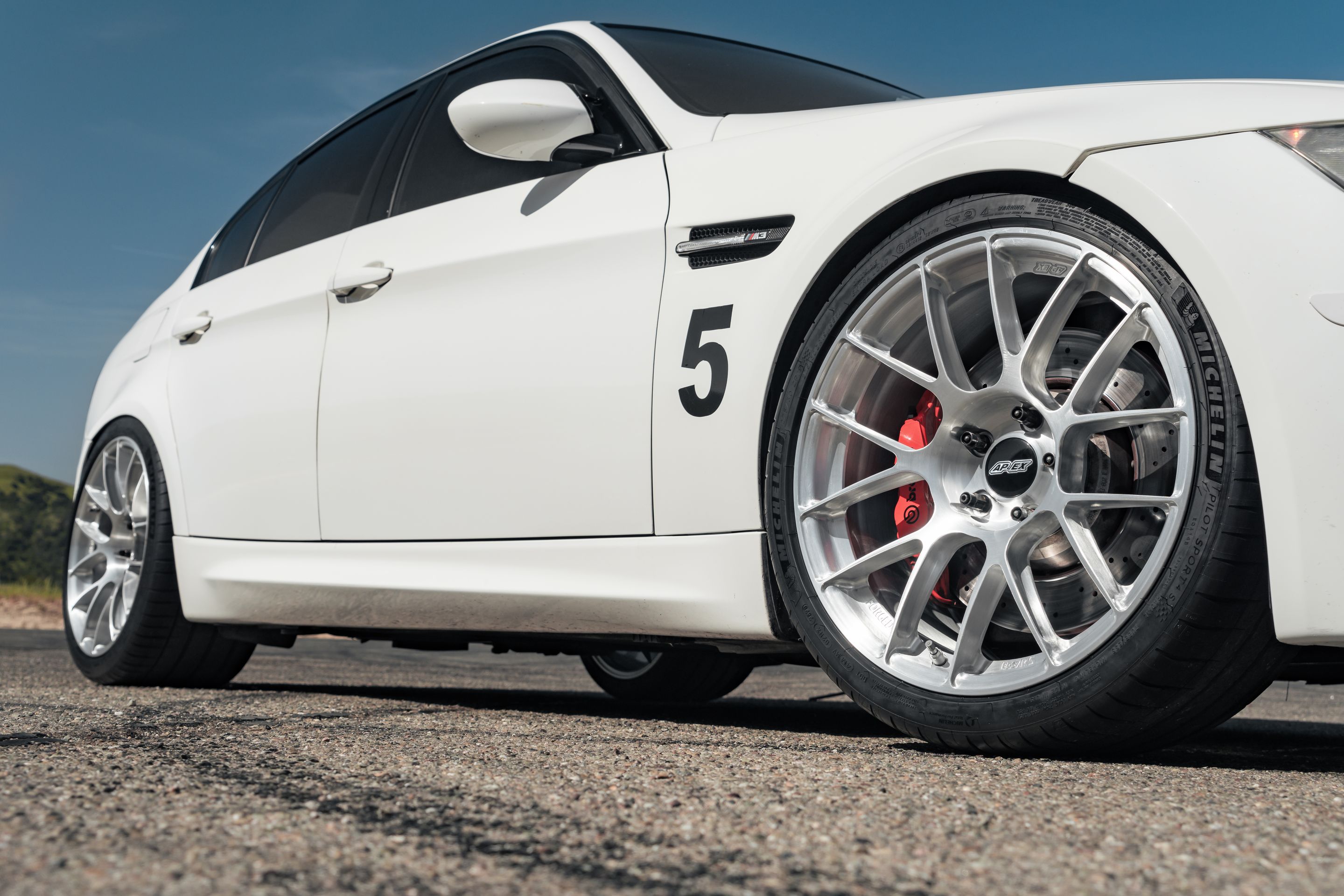 White BMW E90 Sedan M3 with 19" EC-7RS Apex wheels in Brushed Clear