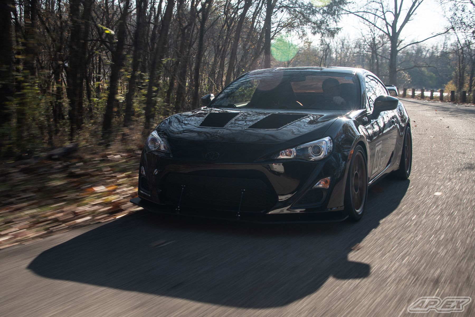 Black Scion FR-S with 17" ARC-8 Apex wheels in Satin Bronze