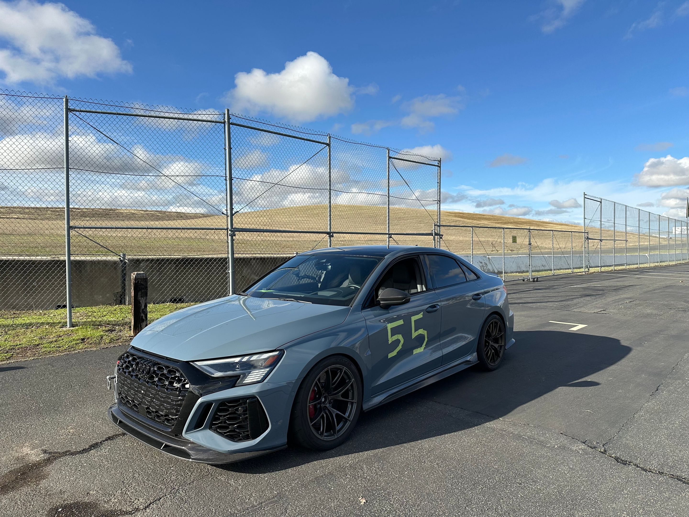 Blue Audi 8Y RS 3 with 18" VS-5RS Apex wheels in Anthracite