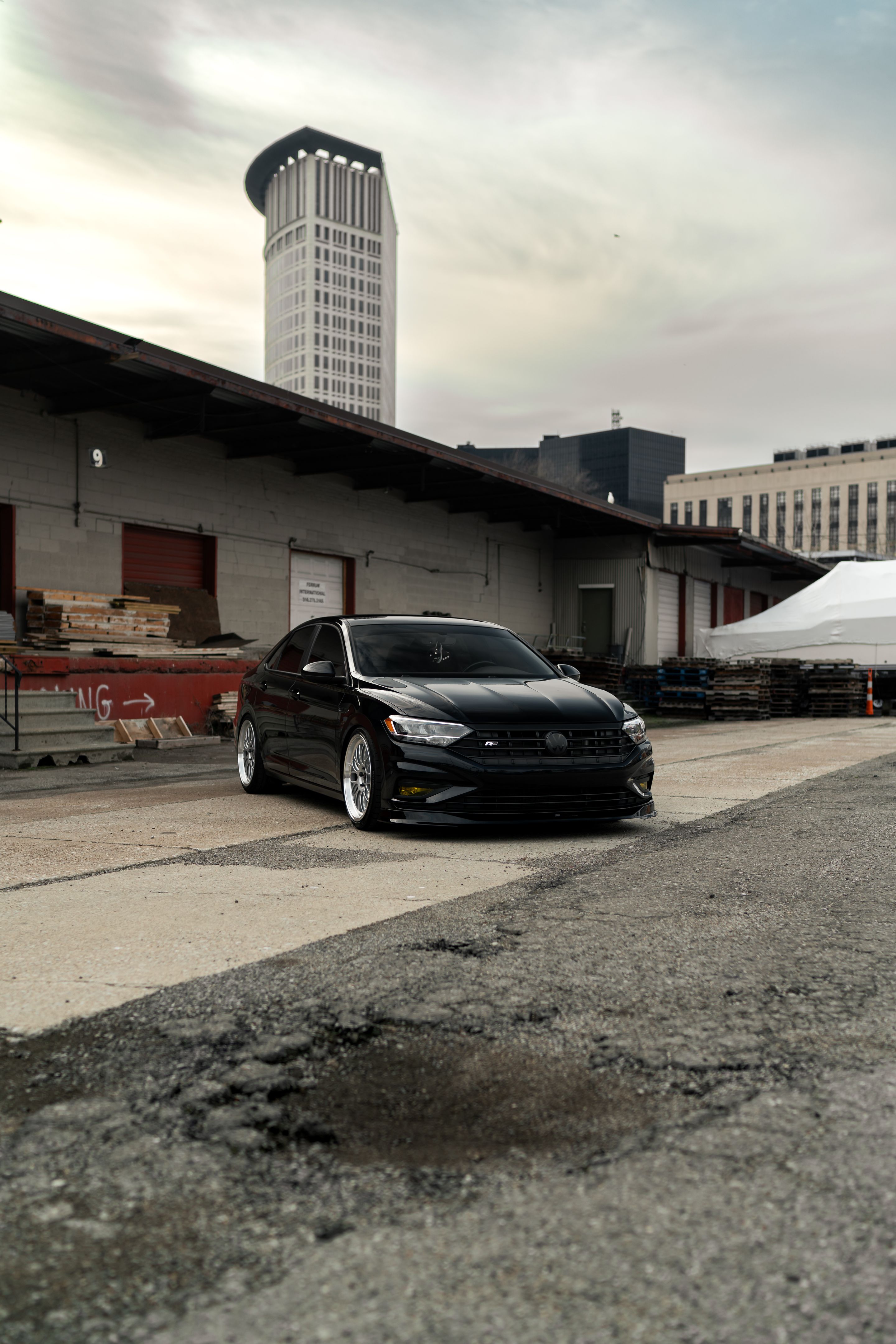 Black VW MK7 Jetta with 19" ML-10RT Apex wheels in Machined Lip Race Silver