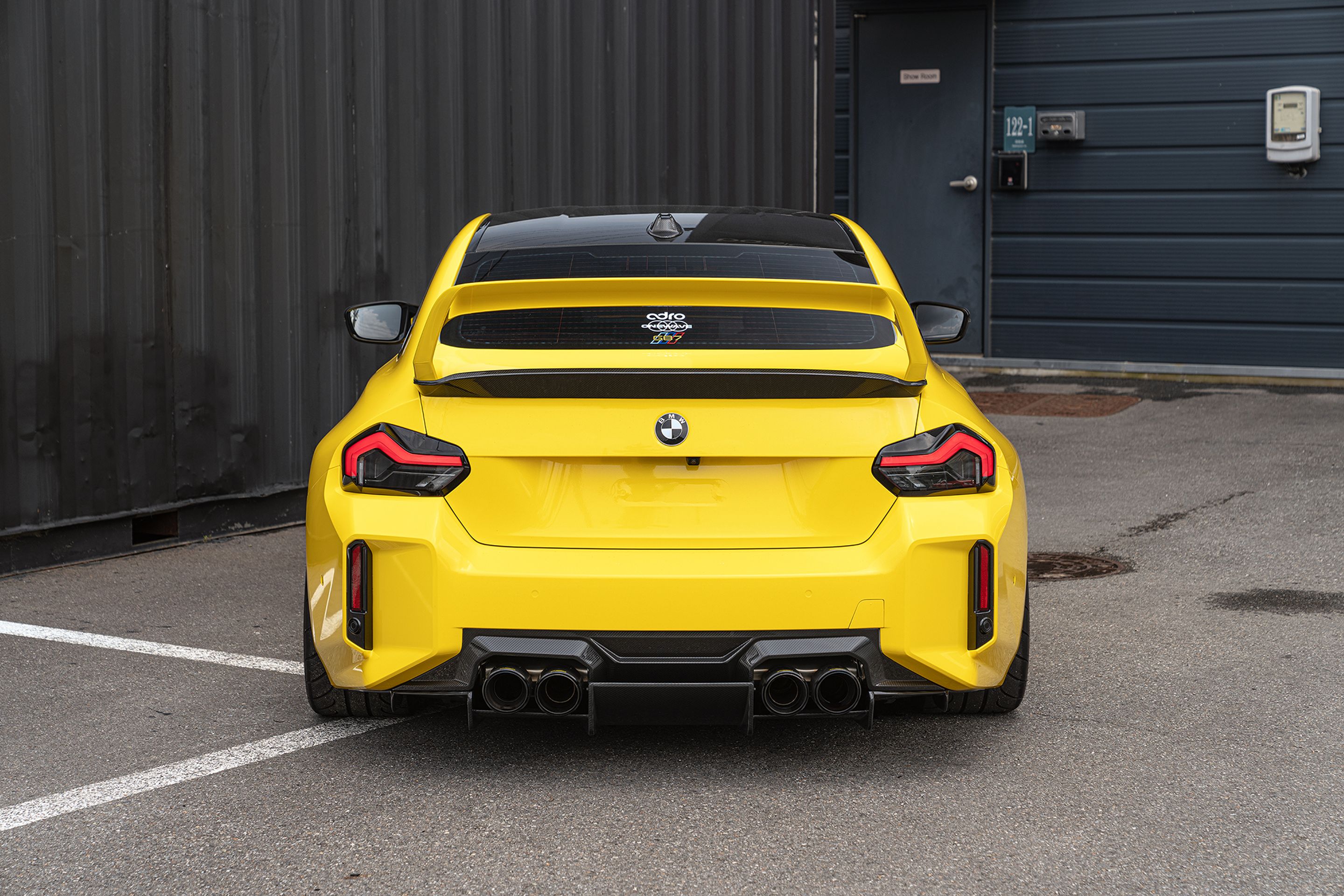Yellow BMW G87 M2 with 19" VS-5RS Apex wheels in Anthracite