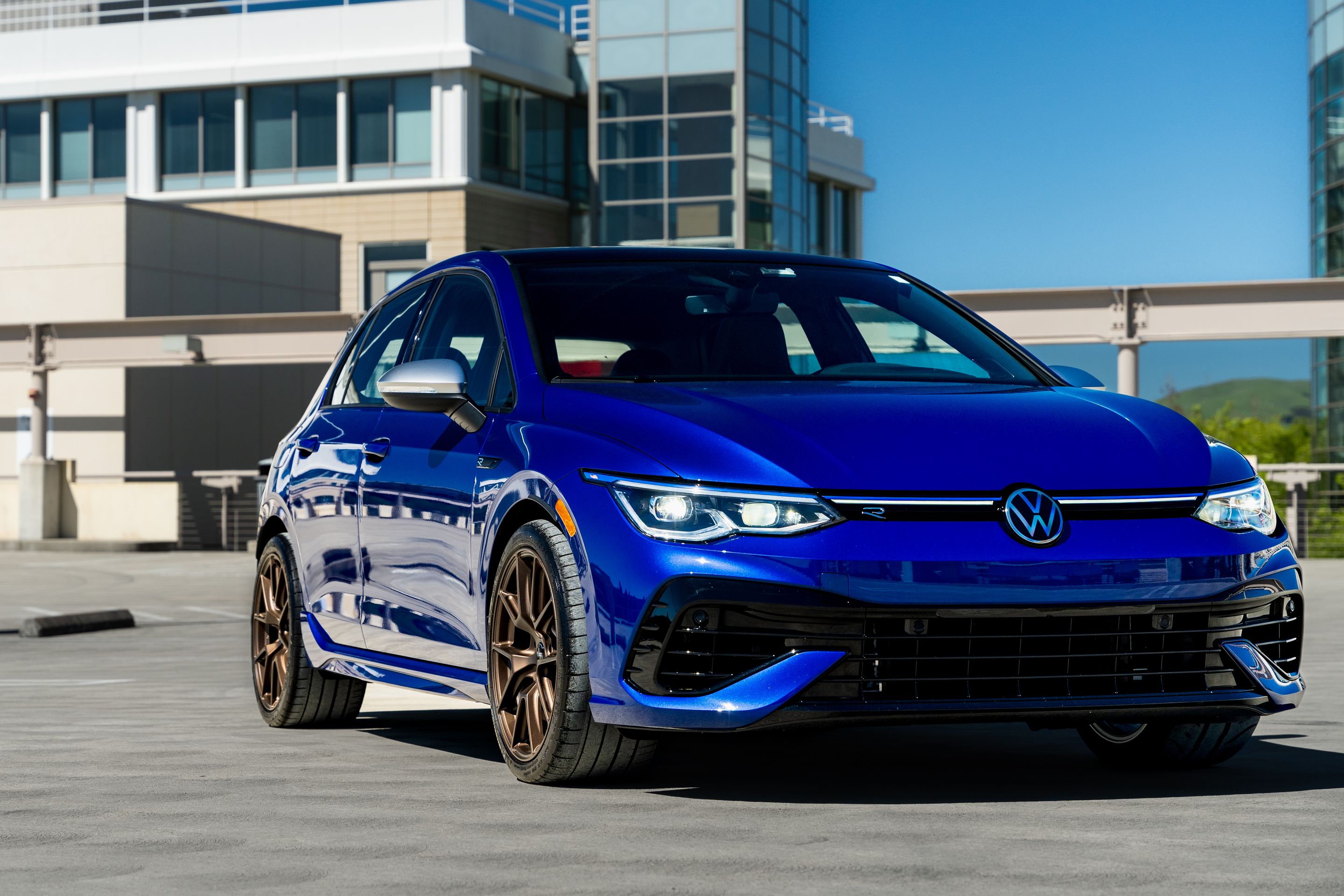 Blue VW MK8 Golf R with 18" VS-5 Apex wheels in Satin Bronze
