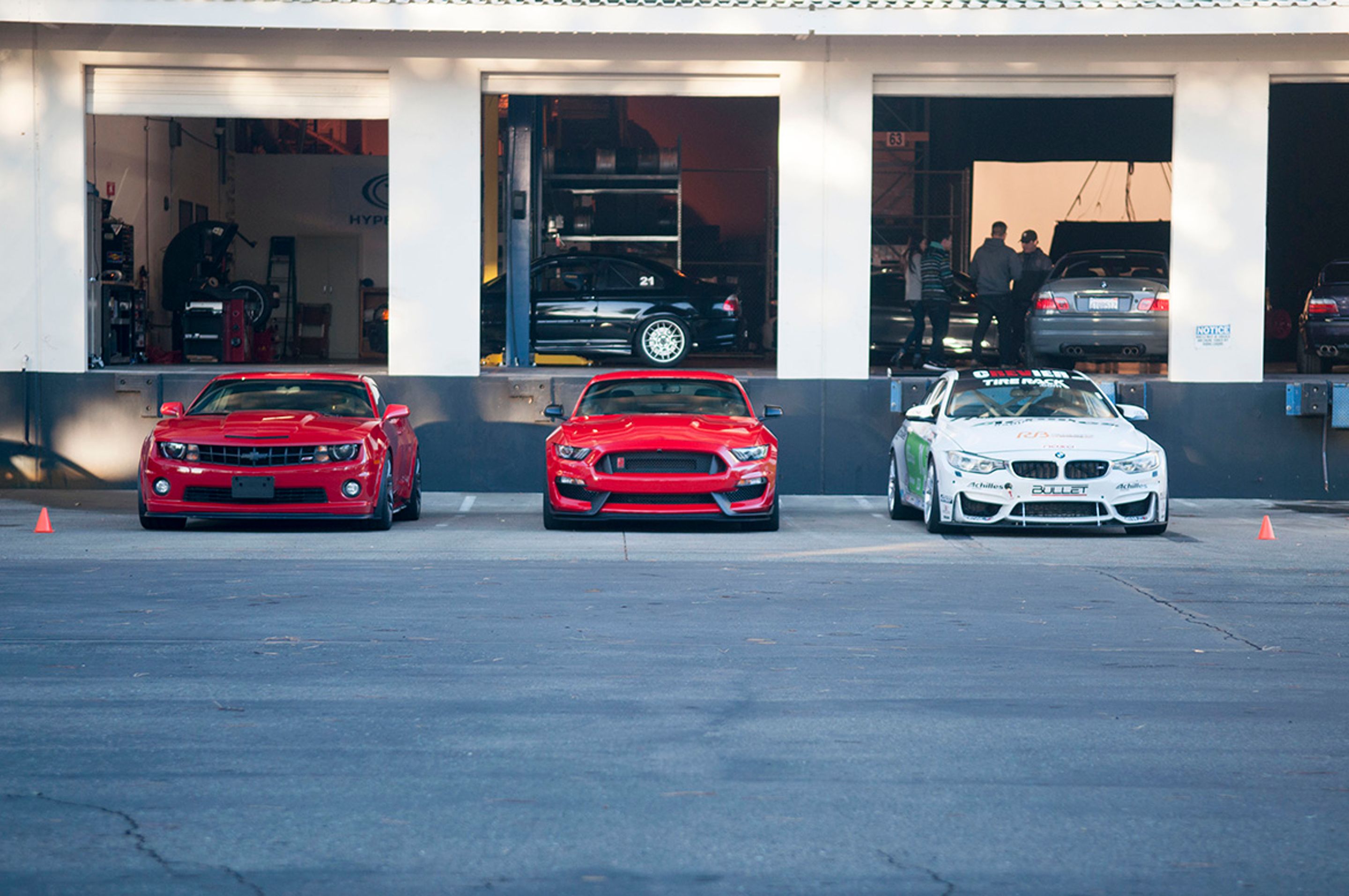 Black Chevrolet 6th Gen Camaro SS with 19" ARC-8 Apex wheels in Satin Black