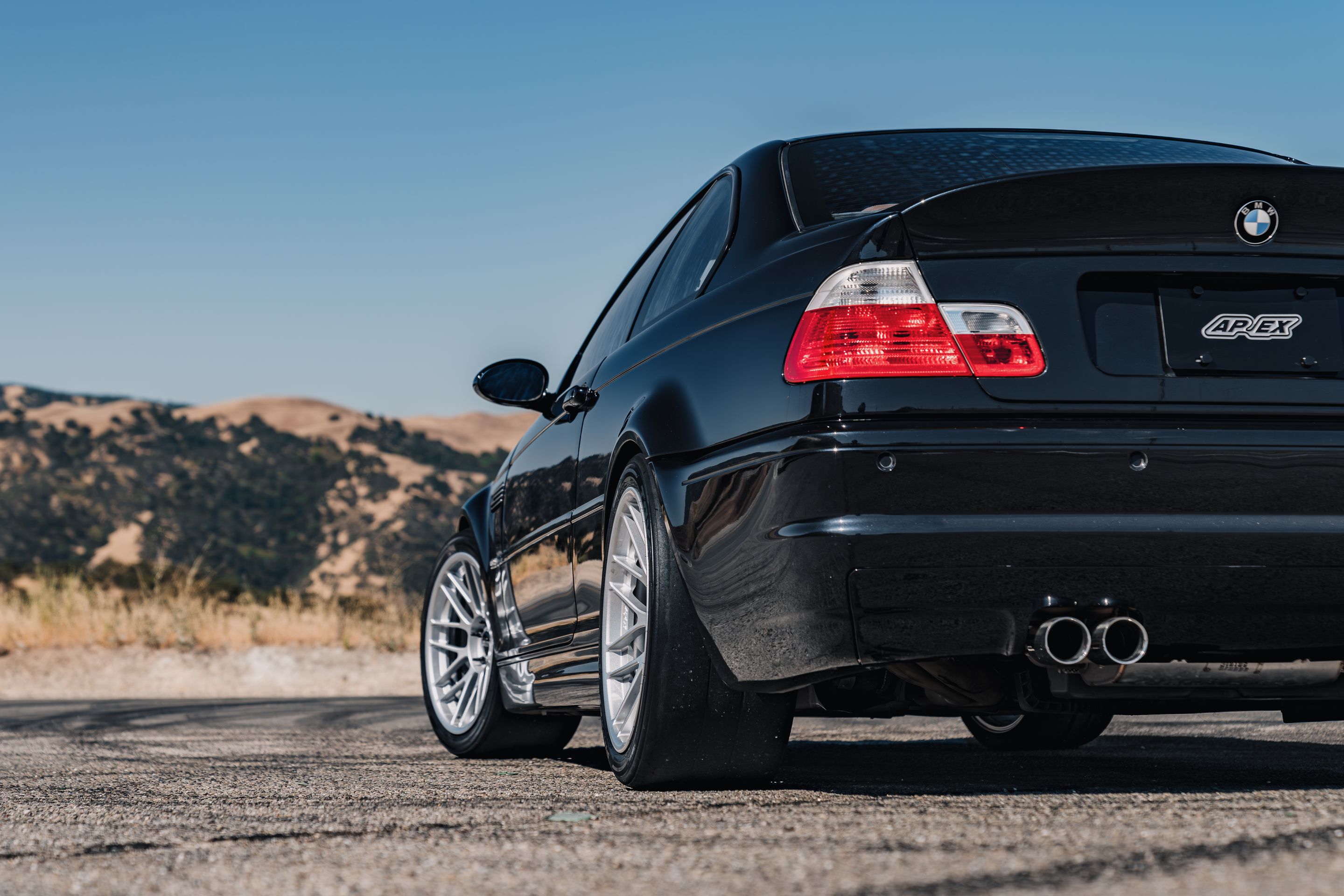 Black BMW E46 M3 with 18" ARC-8RT Apex wheels in Race Silver