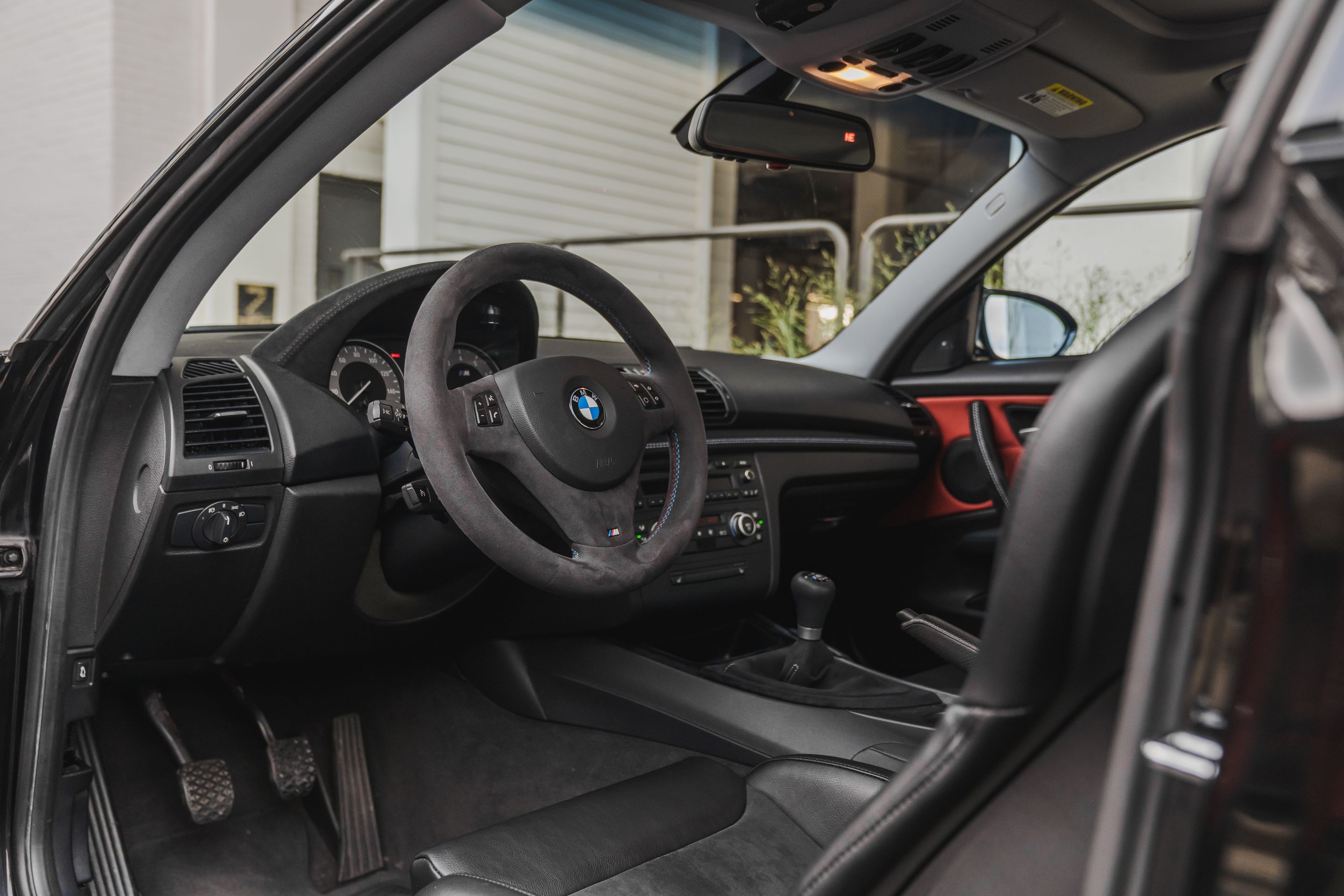 Black BMW E82 Coupe 1 Series with 18" VS-5RS Apex wheels in Motorsport Gold