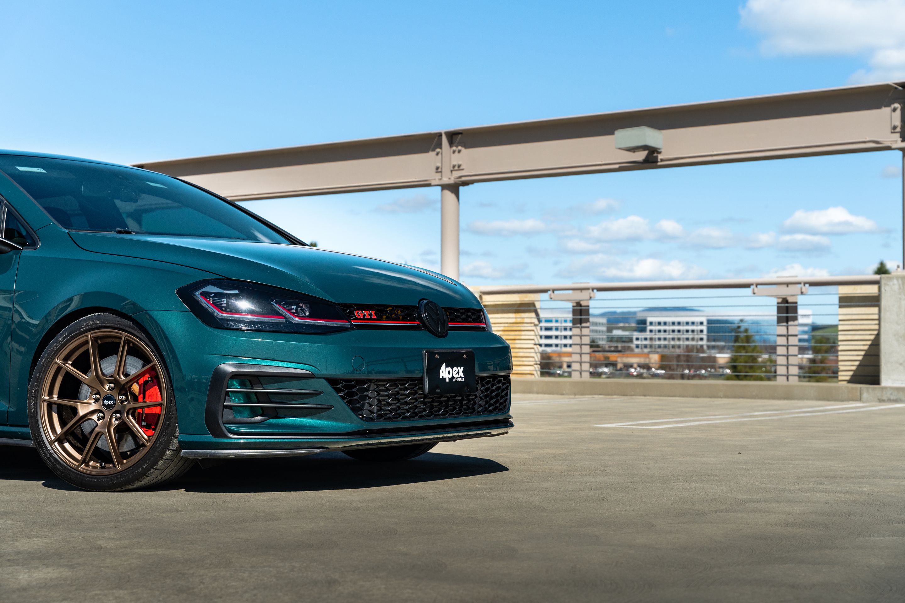 Green VW MK7 GTI with 18" VS-5 Apex wheels in Satin Bronze