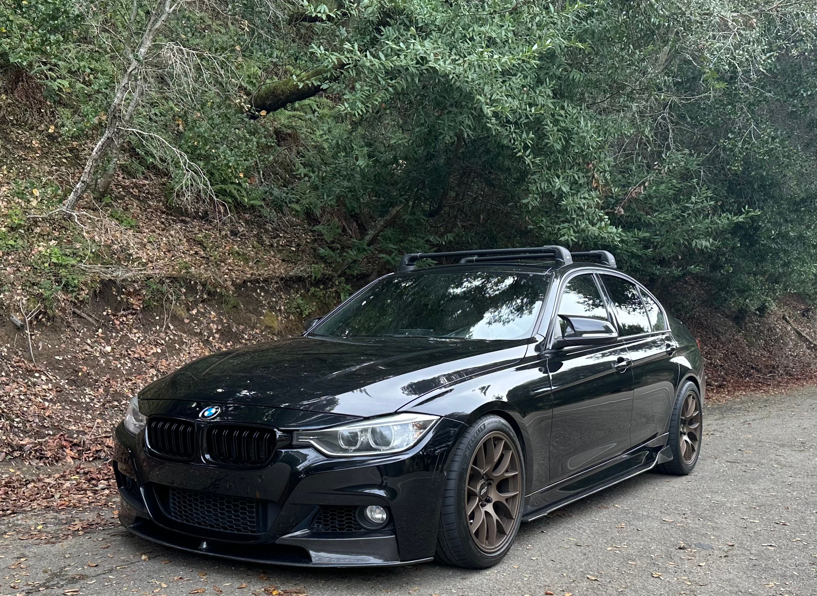 Black BMW F30 Sedan 3 Series with 18" EC-7 Apex wheels in Satin Bronze