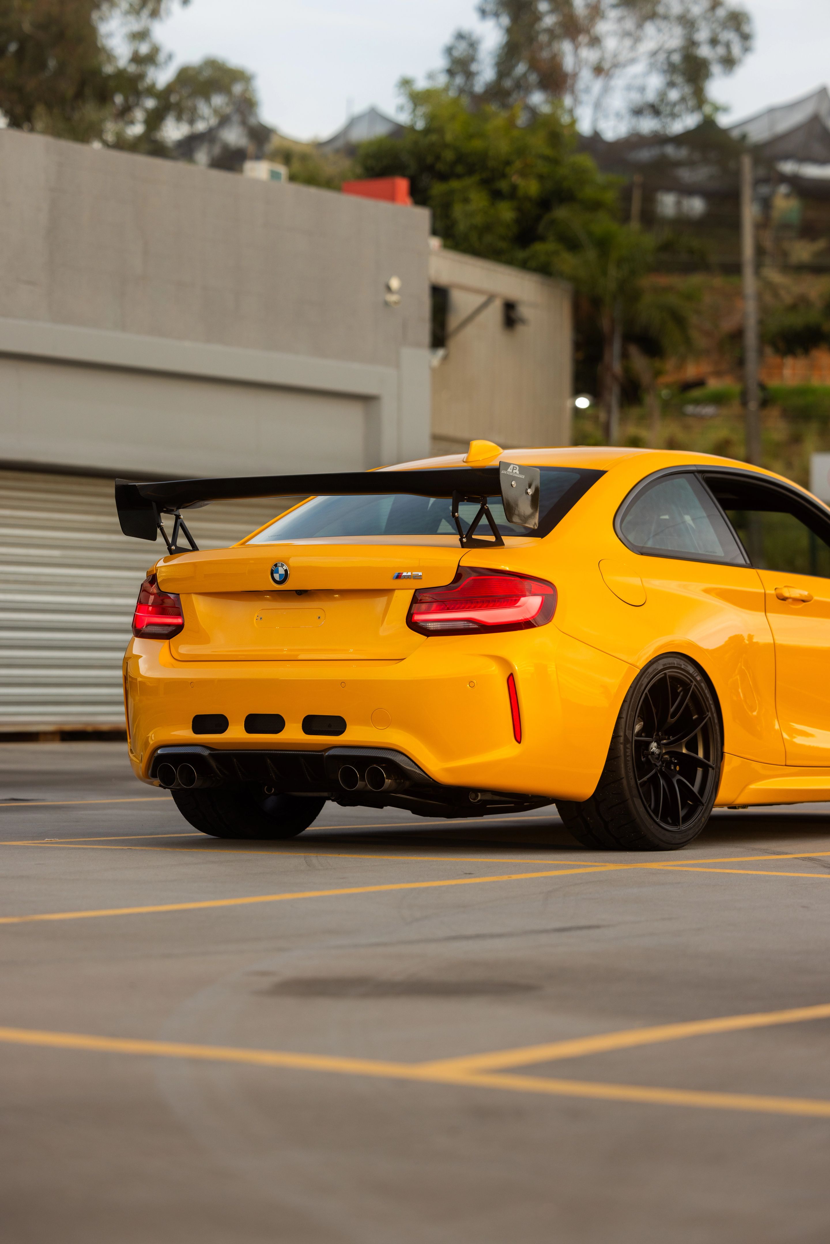 Yellow BMW F87 M2 with 19" VS-5RS Apex wheels in Satin Black