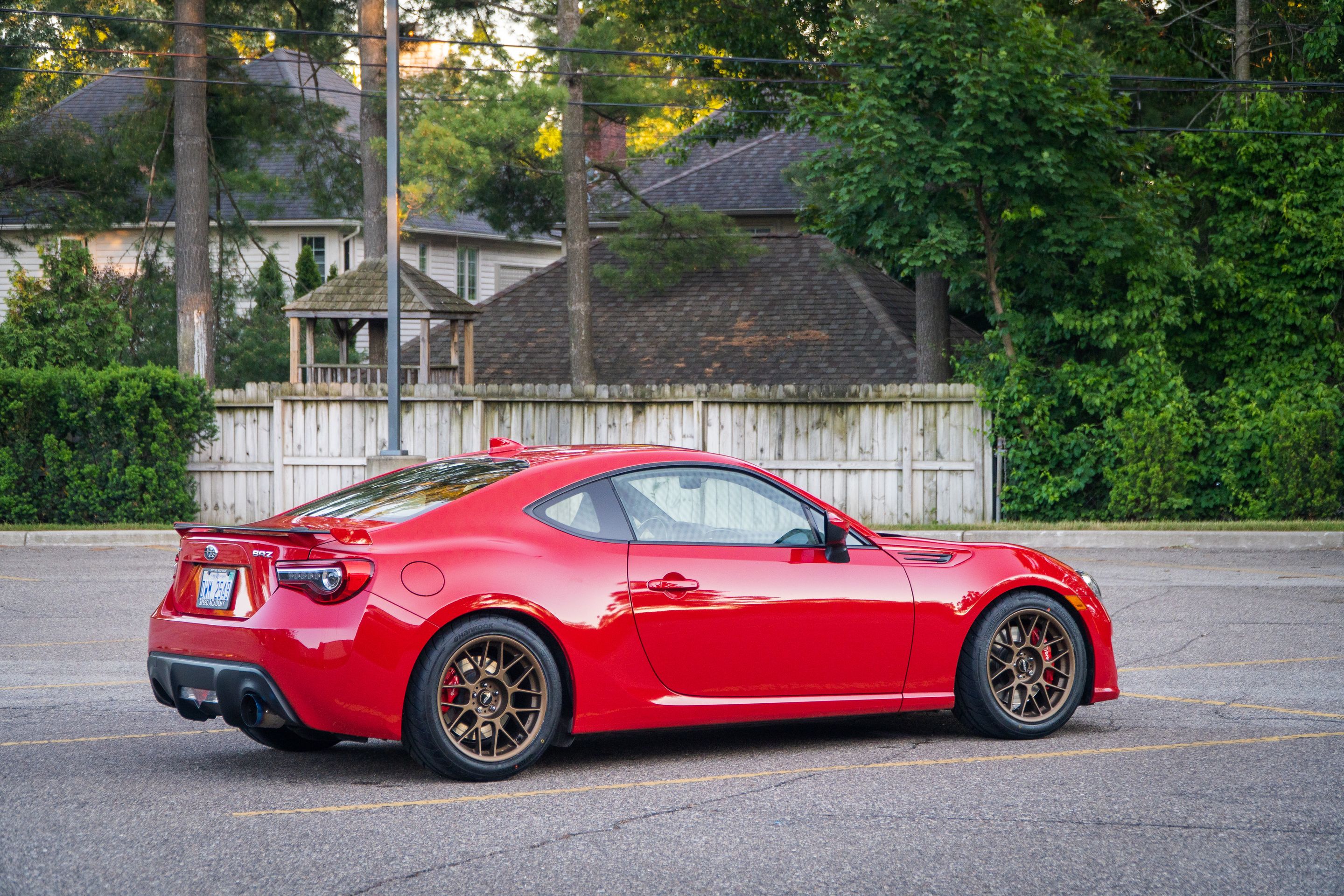 Red Subaru ZC6 / Gen 1 BRZ with 17" ARC-8 Apex wheels in Satin Bronze