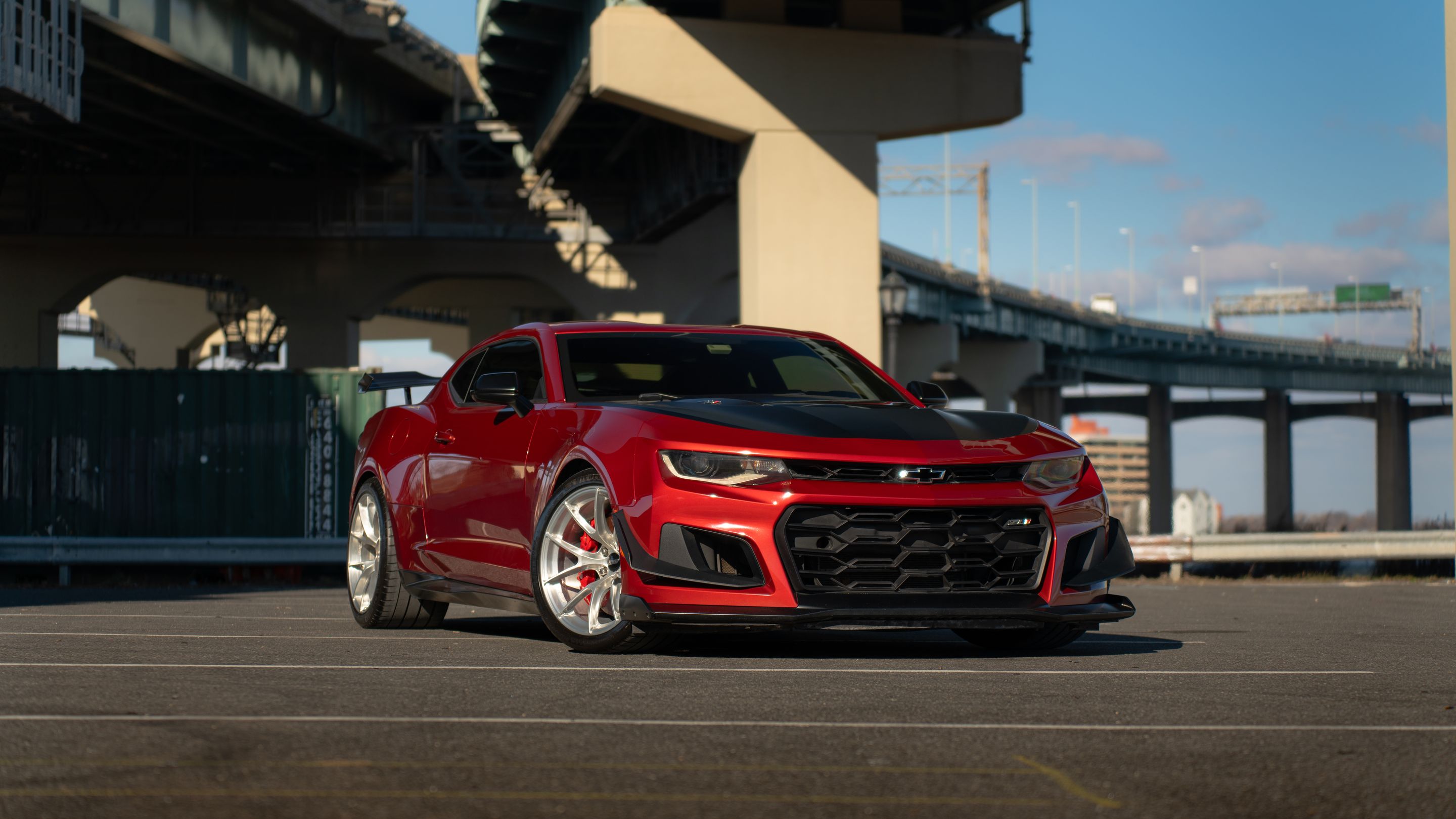 Red Chevrolet 6th Gen Camaro ZL1 with 19" VS-5RS Apex wheels in Brushed Clear