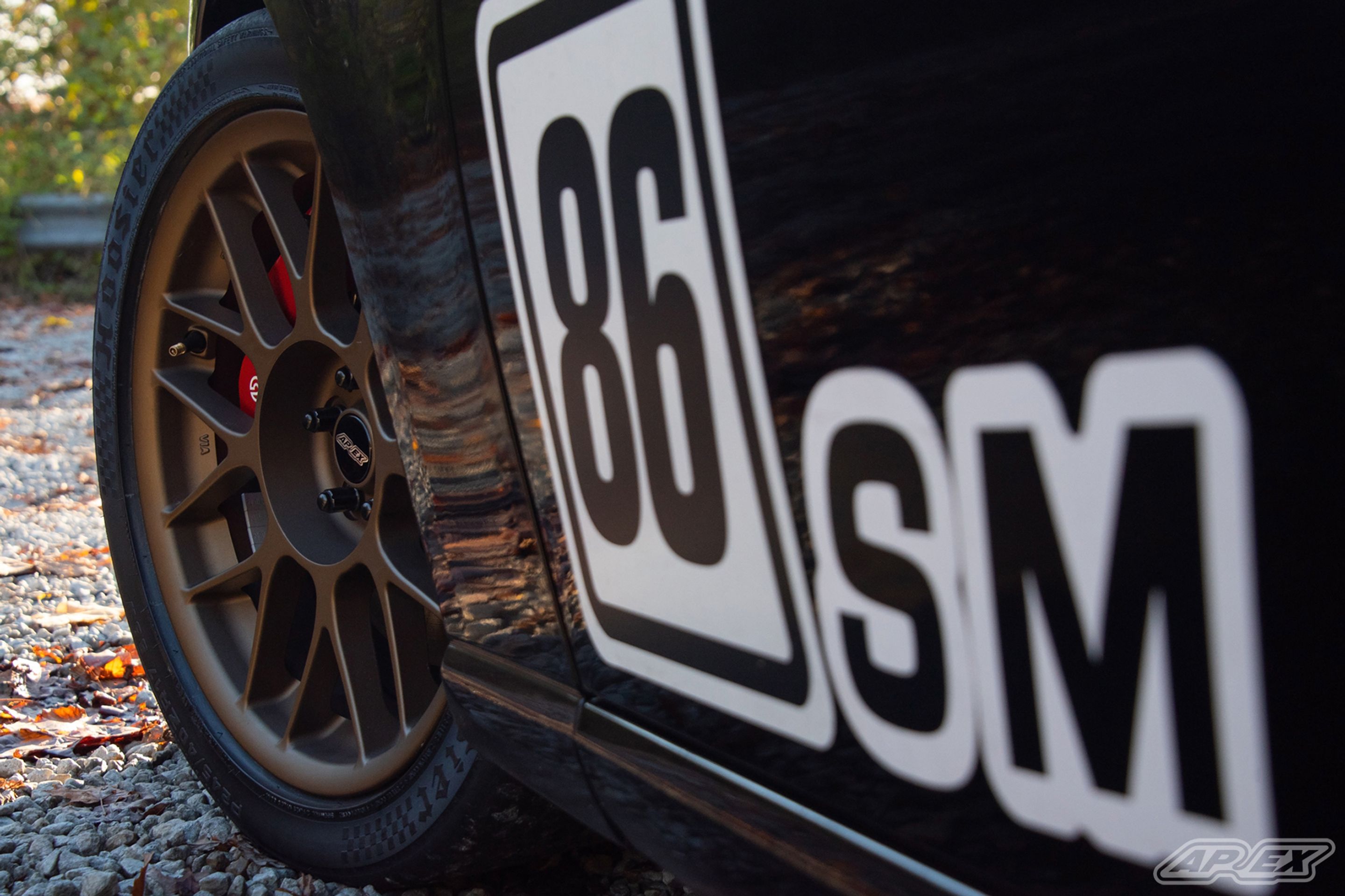 Black Scion FR-S with 17" ARC-8 Apex wheels in Satin Bronze