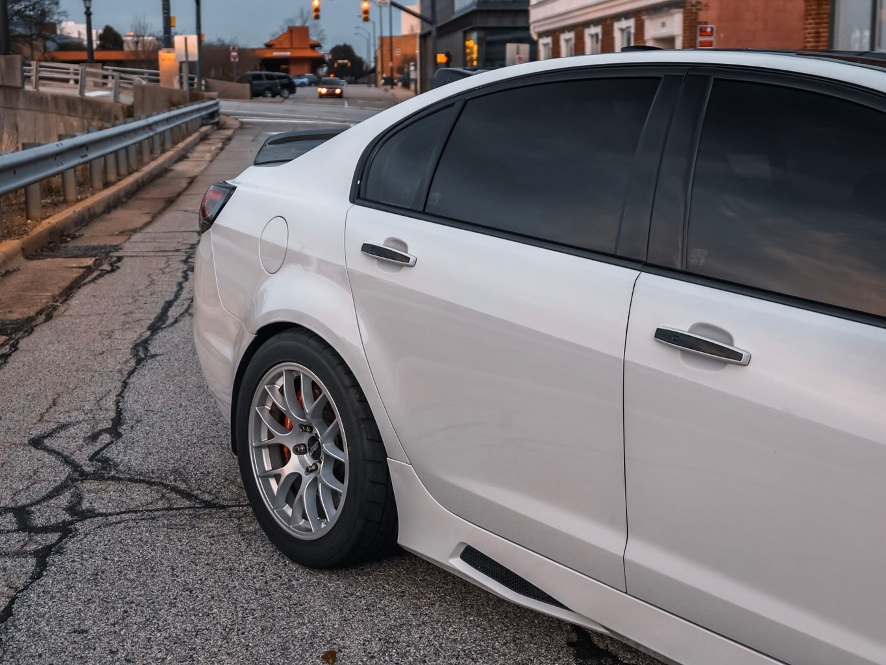 White Chevrolet SS with 19"/18" EC-7 Apex wheels in Race Silver