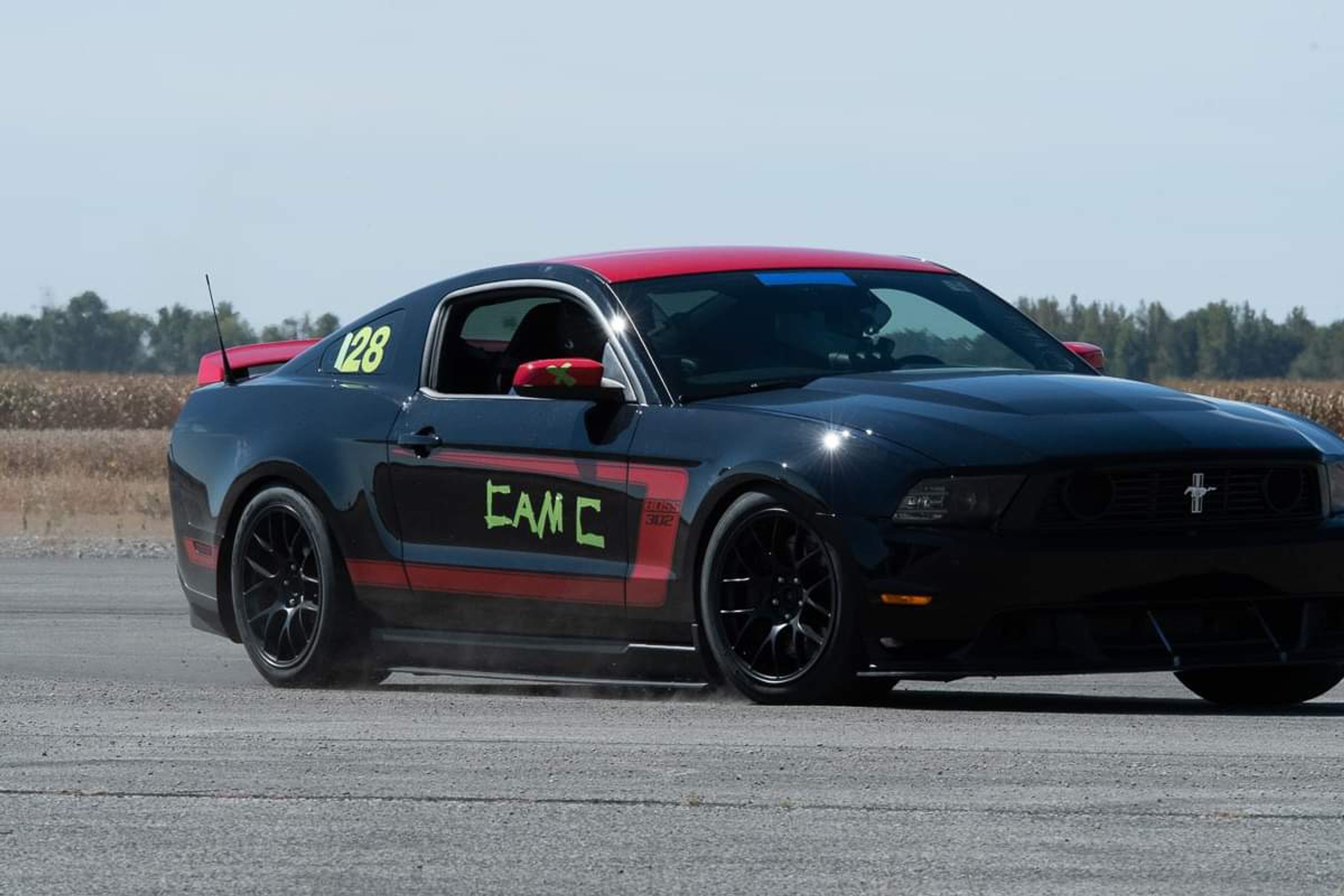 Black Ford S197 Mustang Boss 302 with 18" EC-7 Apex wheels in Satin Black