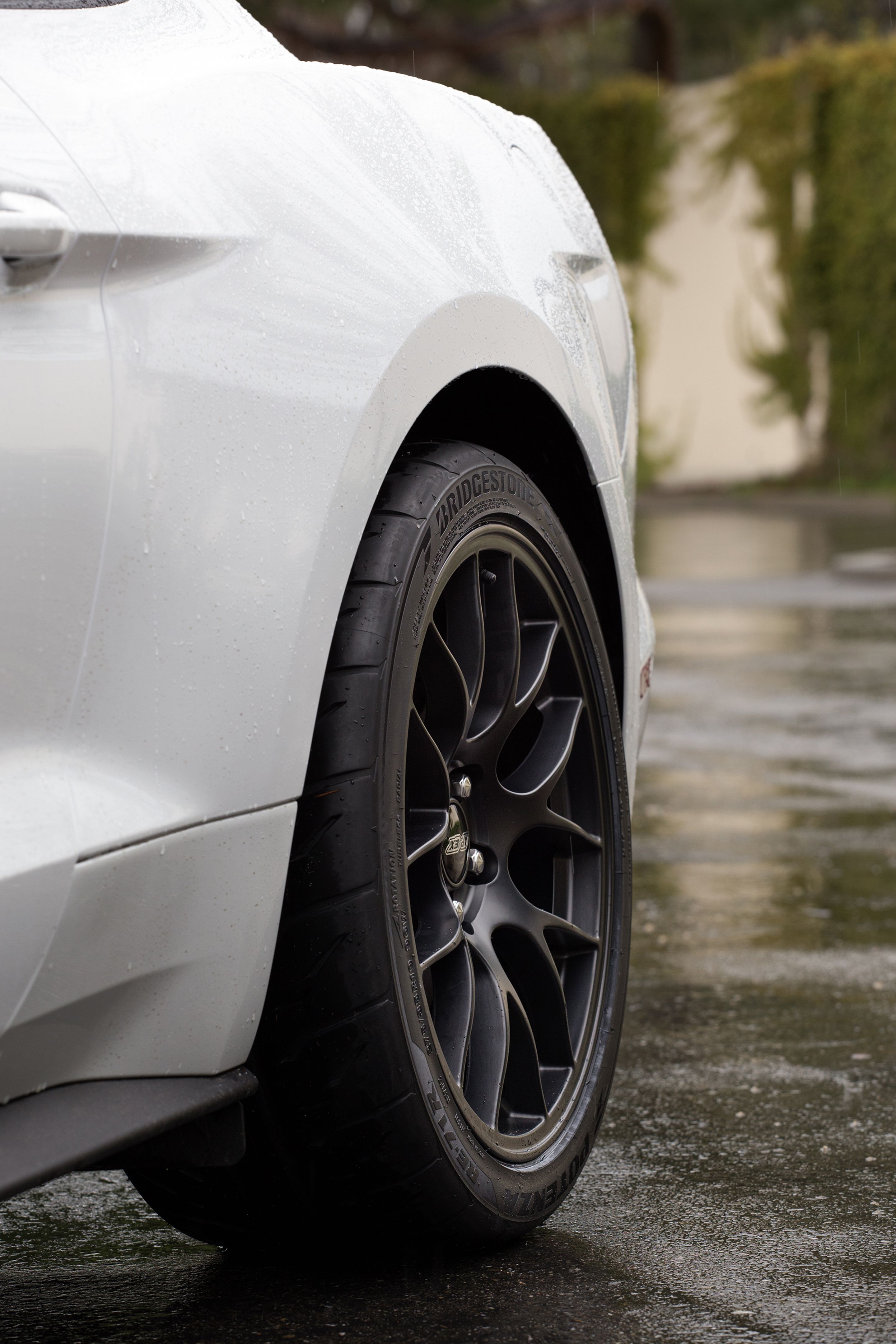 White Ford S550 Mustang GT with 19" EC-7 Apex wheels in Satin Black