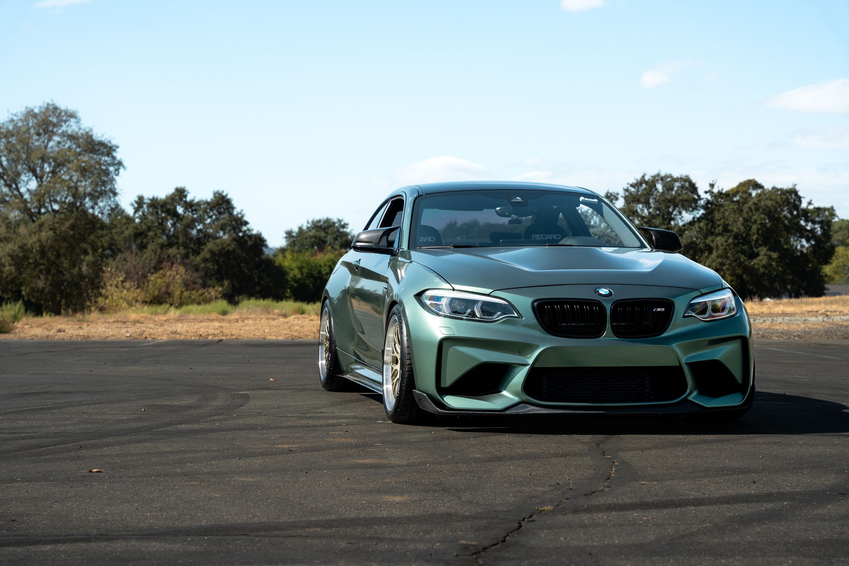 Green BMW F87 M2 with 18" ML-10RT Apex wheels in Machined Lip Gloss Motorsport Gold