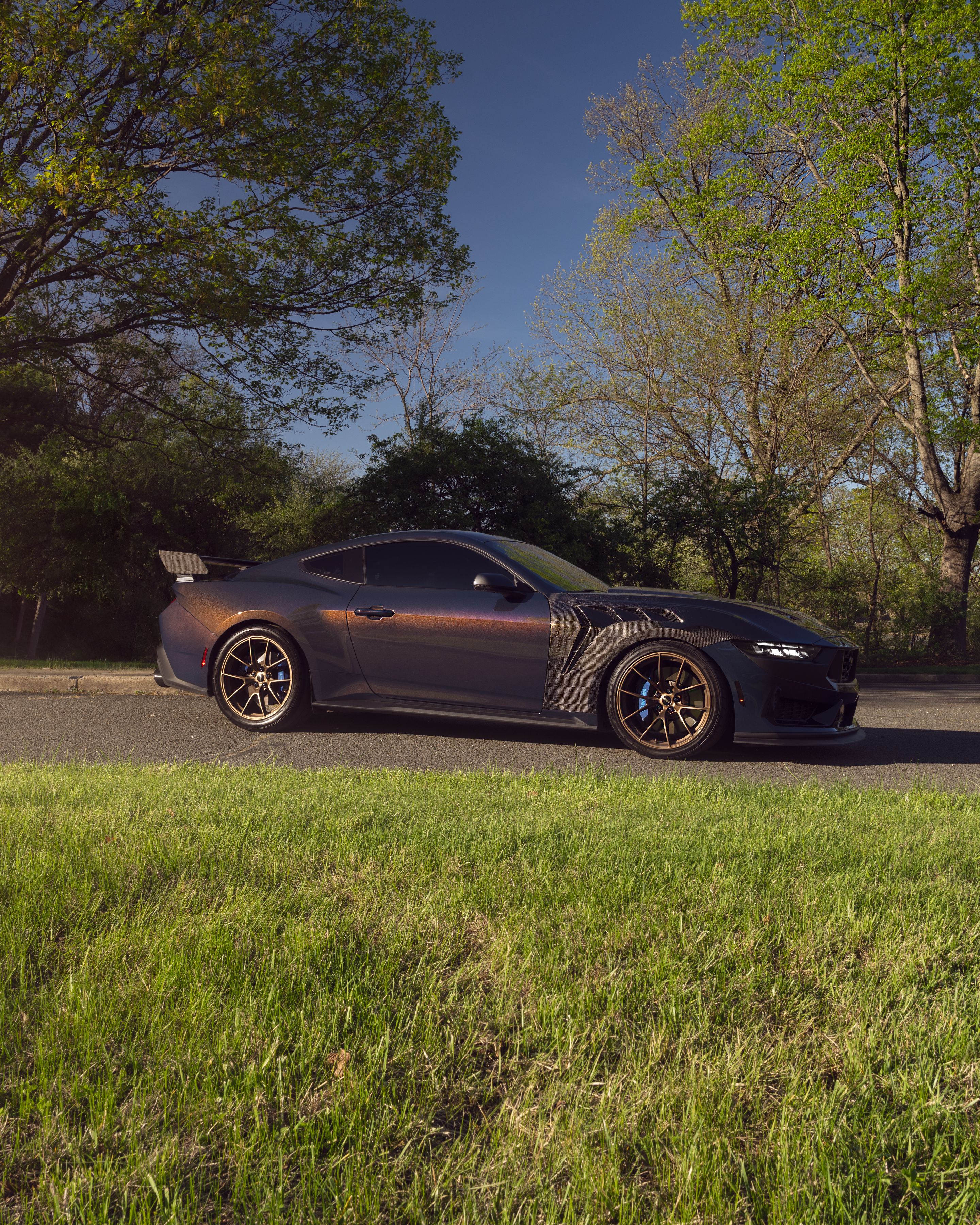 Orange Ford S650 Mustang Dark Horse with 20" VS-5RS Apex wheels in Satin Bronze