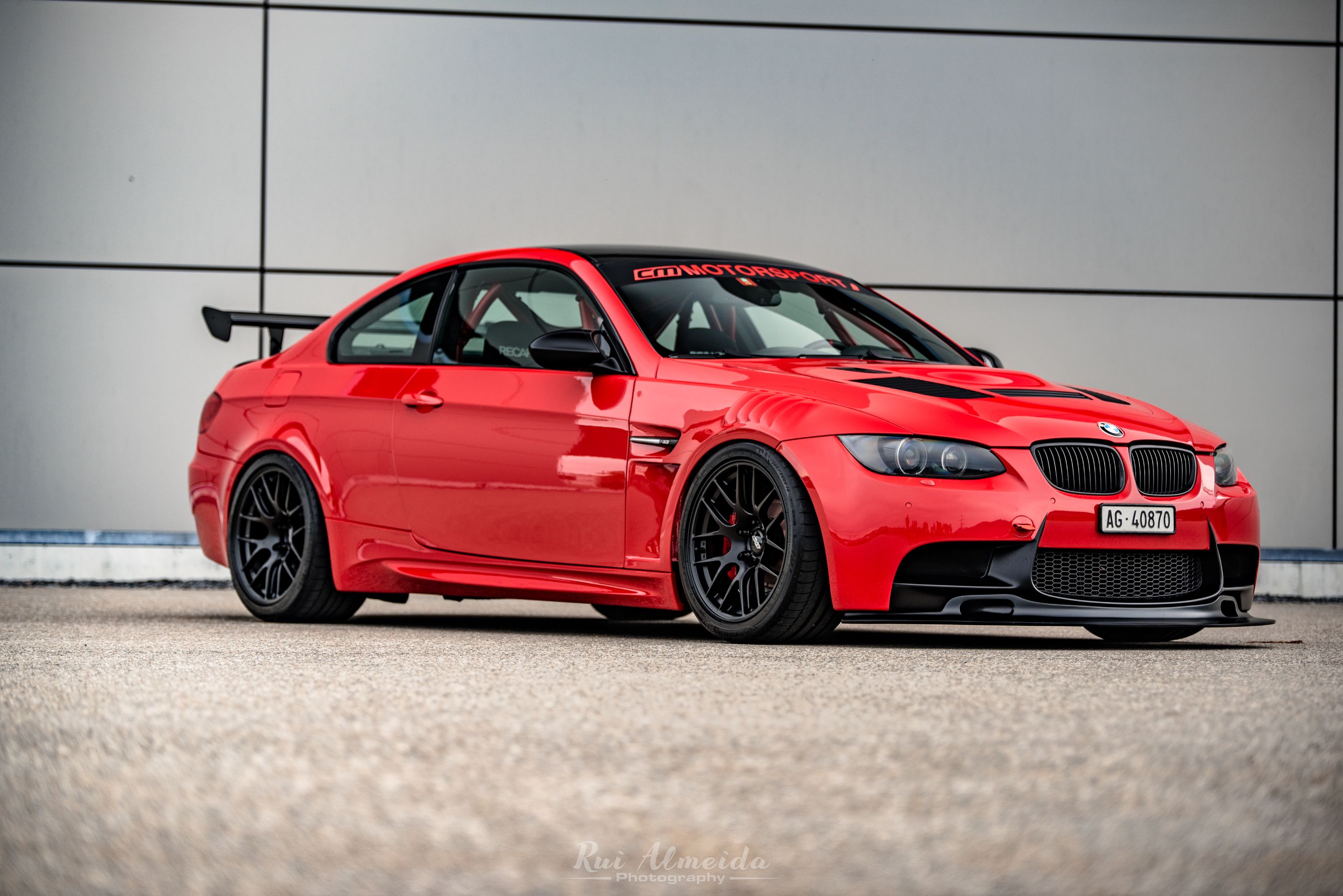 Red BMW E92 Coupe M3 with 18" EC-7R Apex wheels in Satin Black
