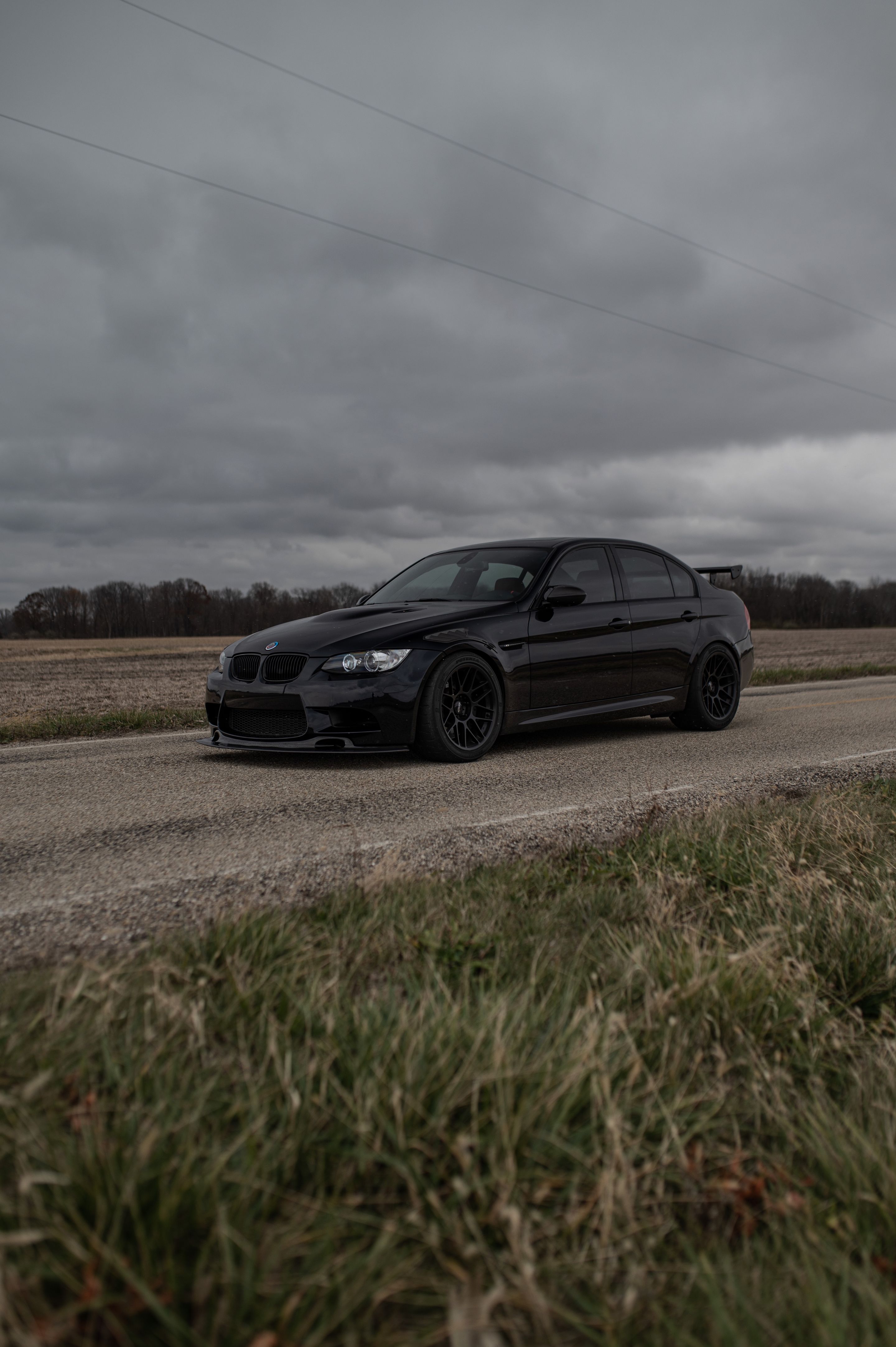 Black BMW E90 Sedan M3 with 18" ARC-8 Apex wheels in Satin Black