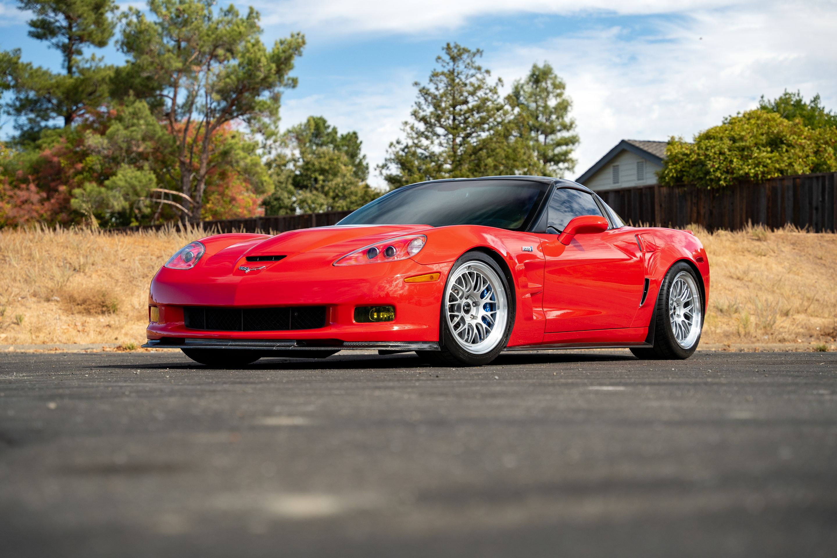 Red Chevrolet C6 Corvette ZR-1 with 18"/19" ML-10RT Apex wheels in Machined Lip Race Silver