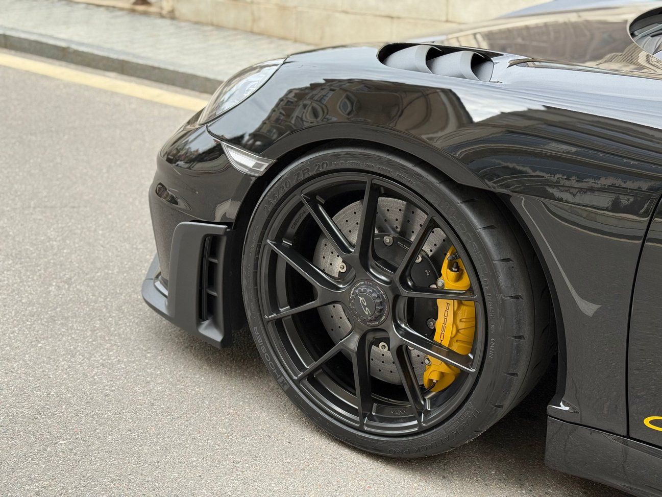 Black Porsche 718 Cayman GT4 RS with 20" VS-5RS Apex wheels in Satin Black