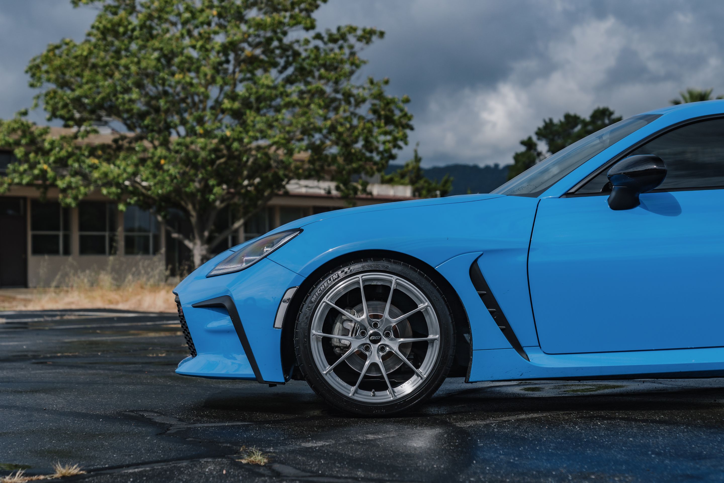 Blue Toyota GR86 with 18" VS-5RS Apex wheels in Brushed Clear