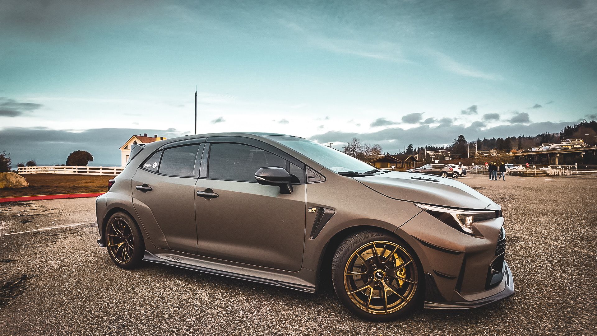 Green Toyota GR Corolla with 18" VS-5RS Apex wheels in Satin Bronze