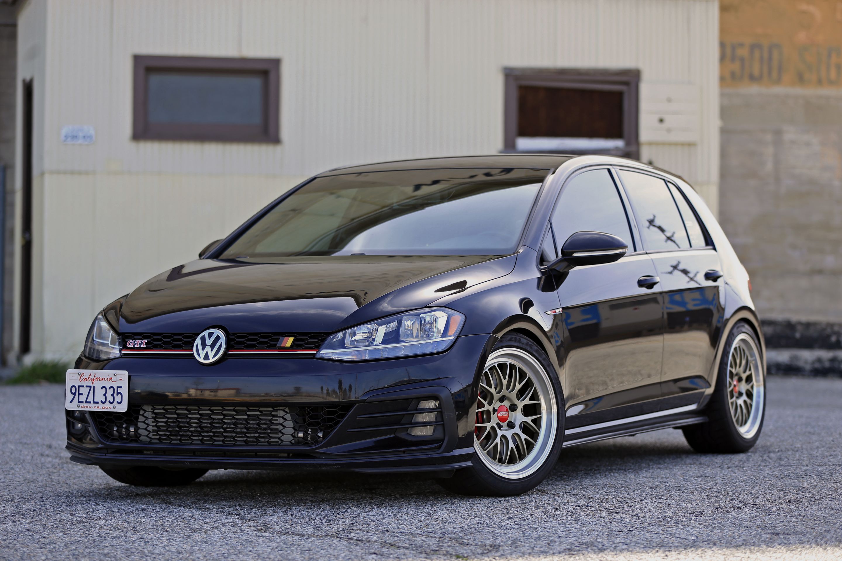 Black VW MK7 GTI with 18" ML-10RT Apex wheels in Machined Lip Gloss Motorsport Gold