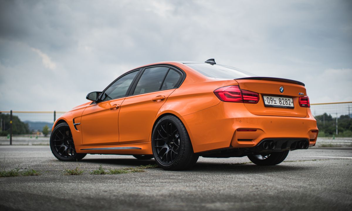 Orange BMW F80 M3 with 19" EC-7 Apex wheels in Satin Black