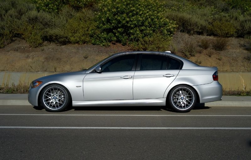 Silver BMW E90 Sedan 3 Series with 18" ARC-8 Apex wheels in Hyper Black