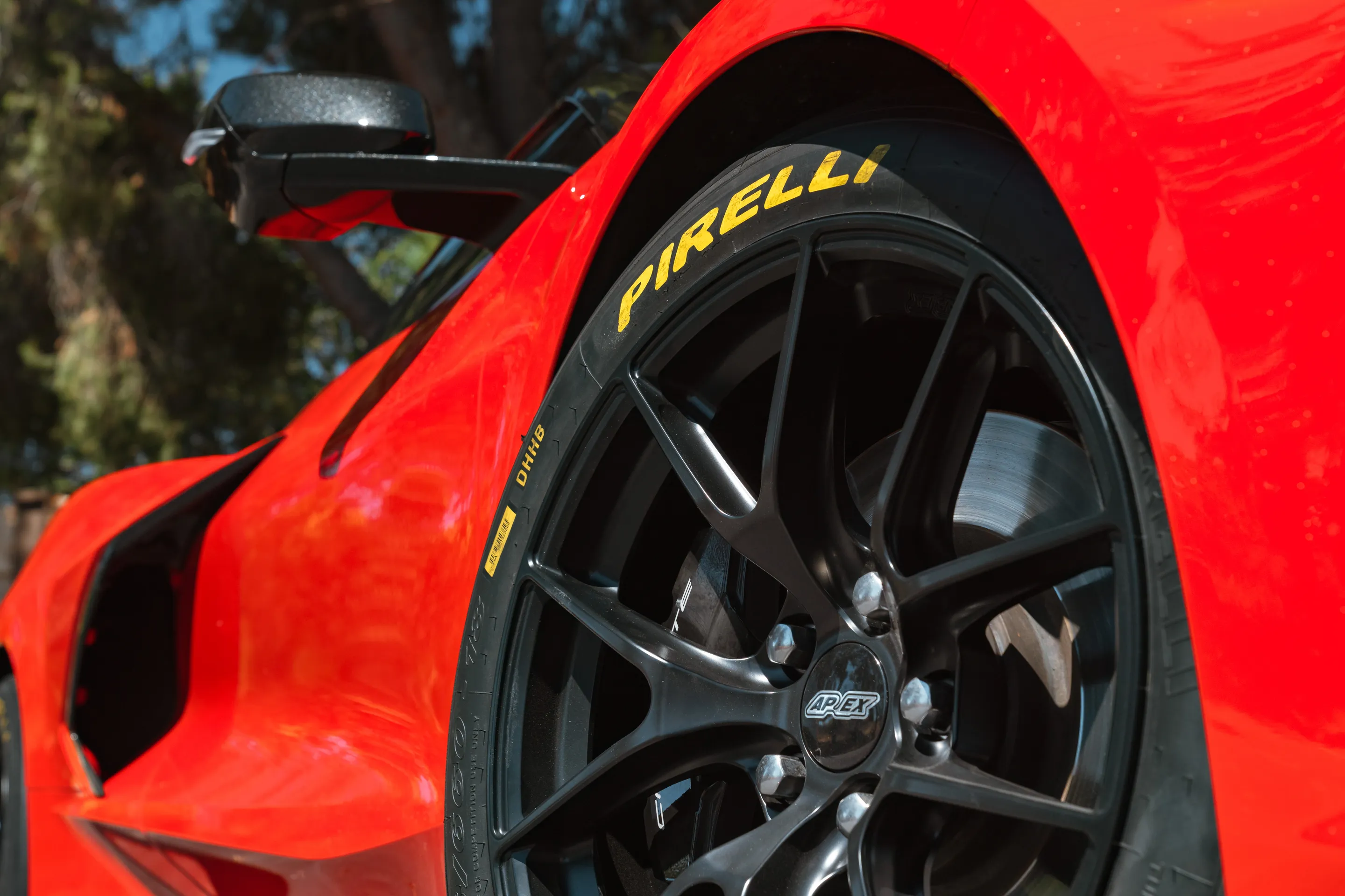 Red Chevrolet C8 Corvette Stingray/Z51 with 18" VS-5RS Apex wheels in Satin Black